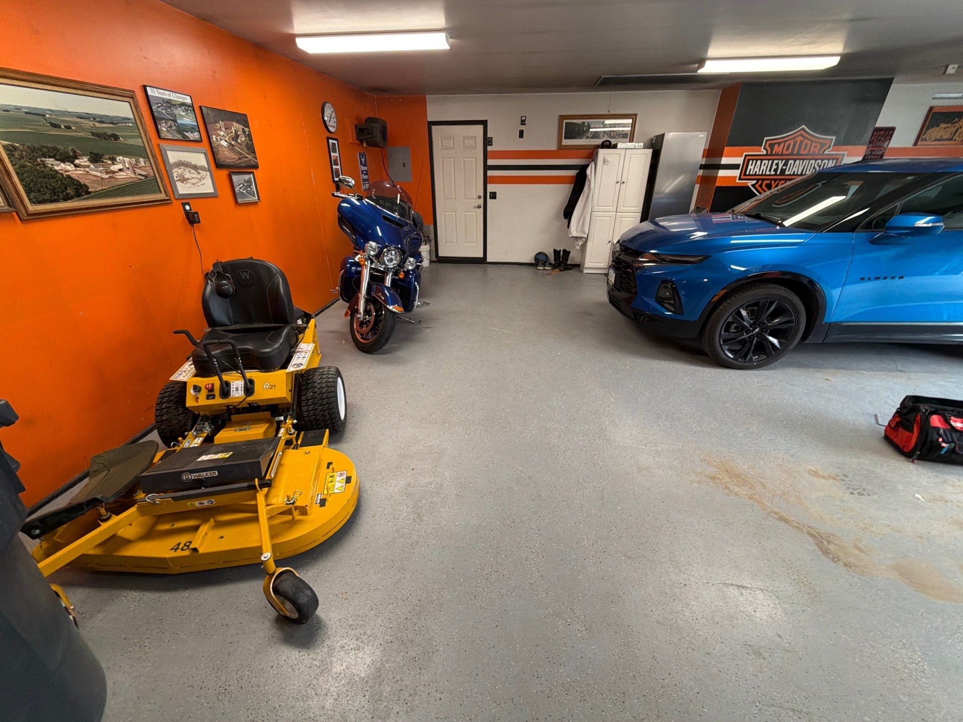 Custom Grey Flake Epoxy Garage Floor Installation in Remsen by Select Painting, Coatings & Garage Cabinets