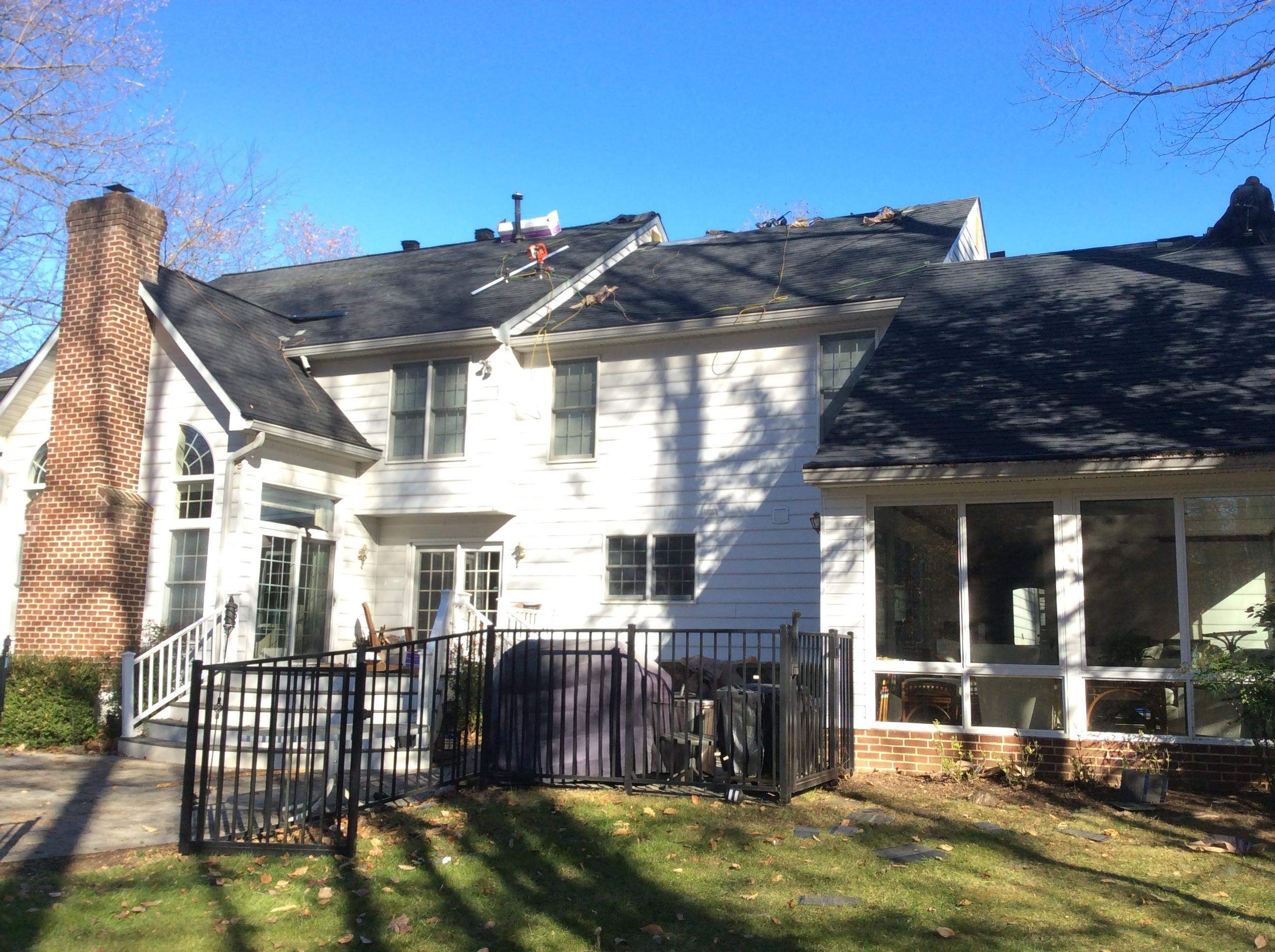 Residential Roofing Installation using Charcoal Black by Alpha Design Services
