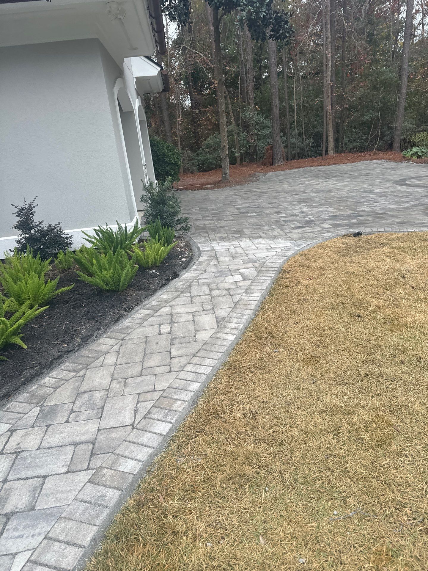 Custom Paver Driveway and Textured Pool Deck Installation in Hilton Head Island by Lowcountry Scapes, LLC