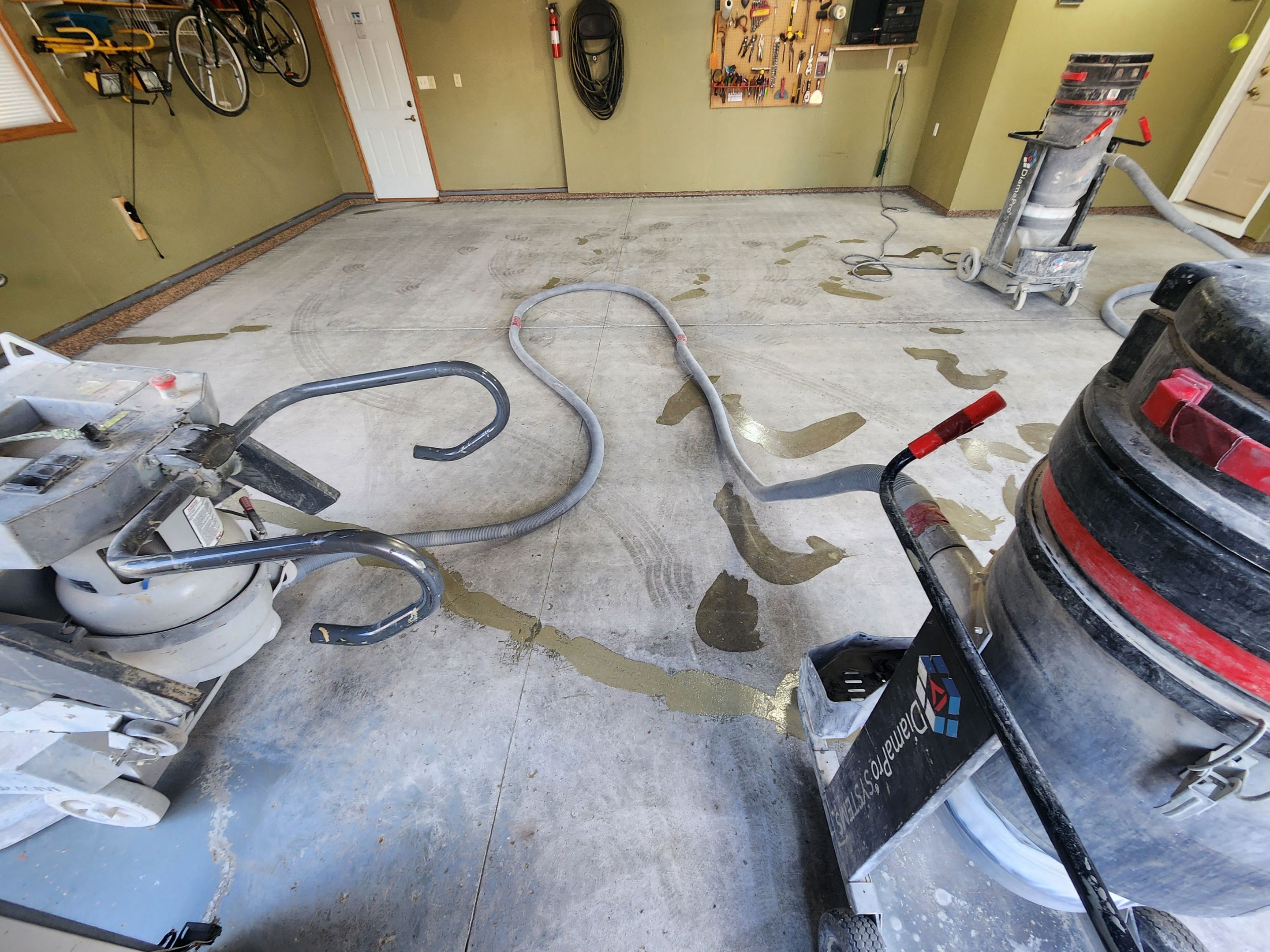 Sioux Falls Garage Floor Concrete Coating with Textured Aggregate by Select Painting, Coatings & Garage Cabinets