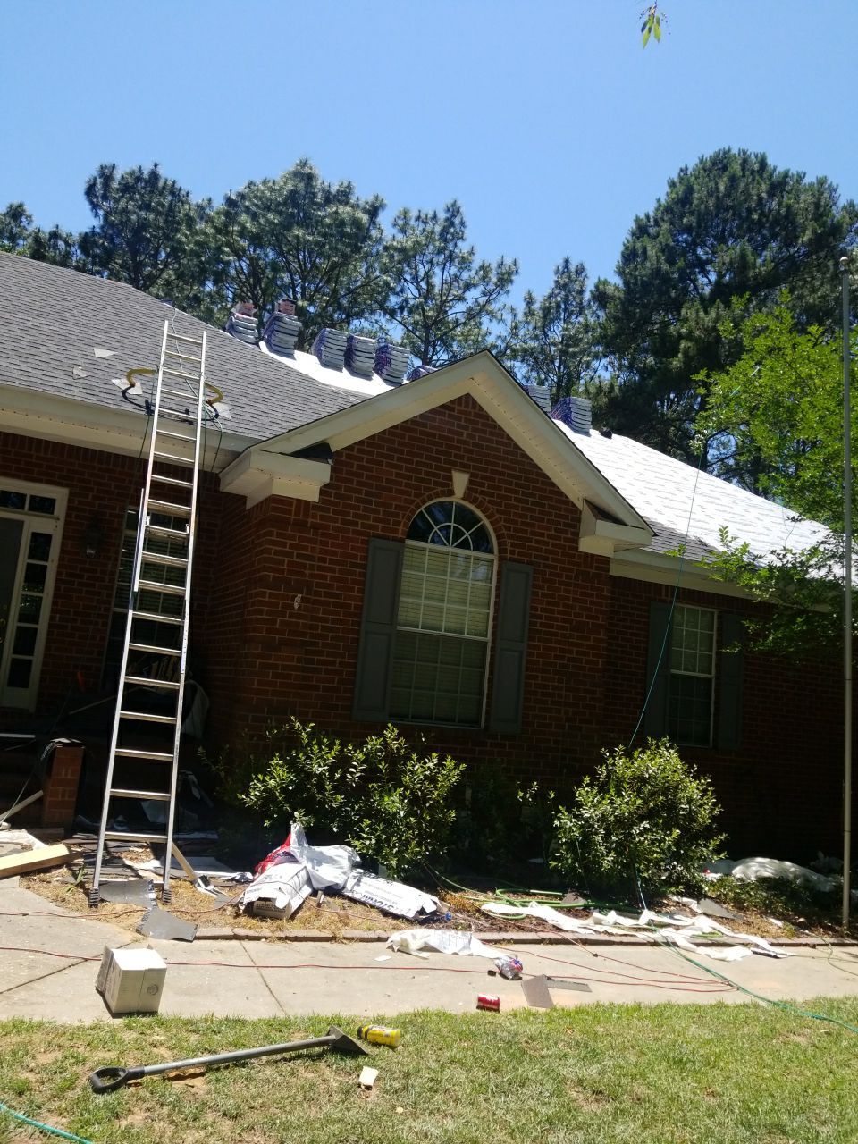 Residential Roofing Installation using Roof Replacement by American Roofing & Construction LLC