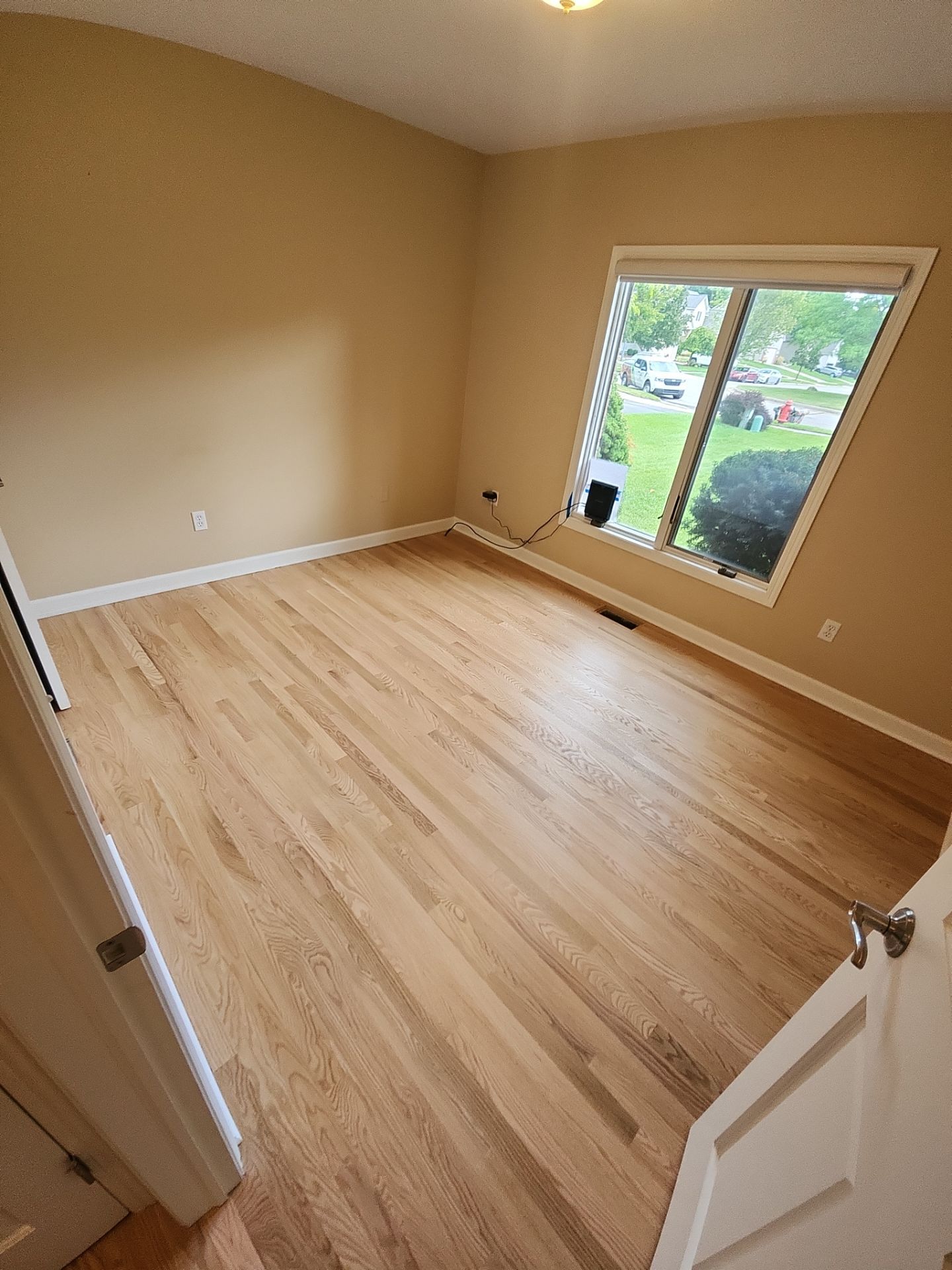 New Red Oak Natural bedroom and hall  by Ann Arbor Hardwoods 