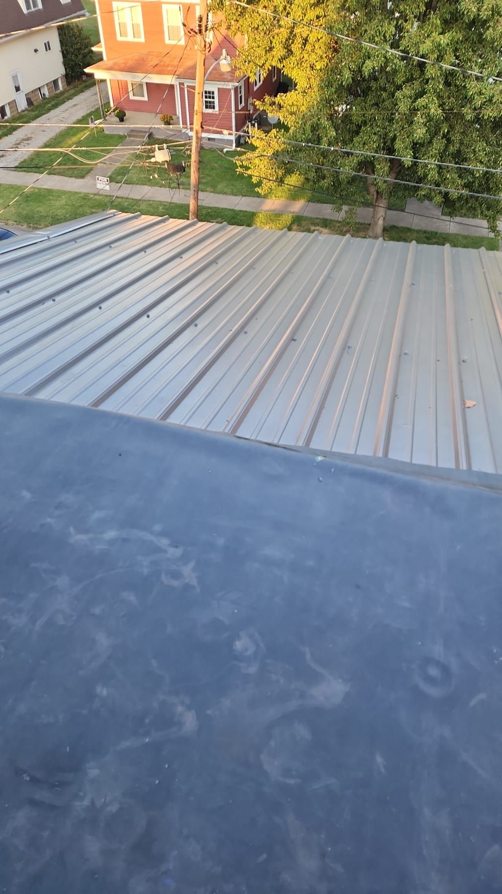 Residential Roofing Installation using Metal by Rainstoppers Roofing