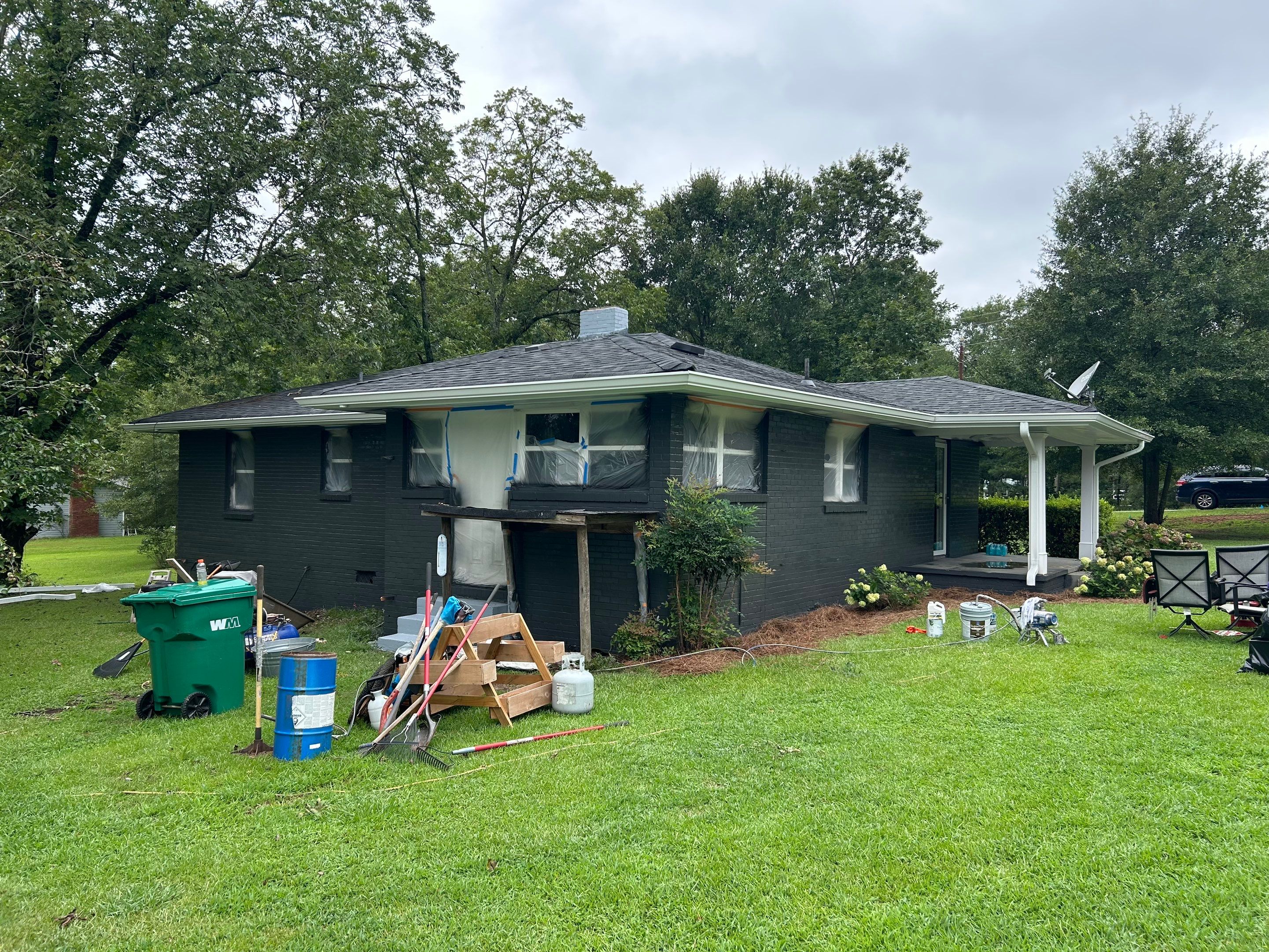 Social Circle Masonry Transformation with Dark Charcoal Exterior Painting by PGP Surface Solutions, LLC