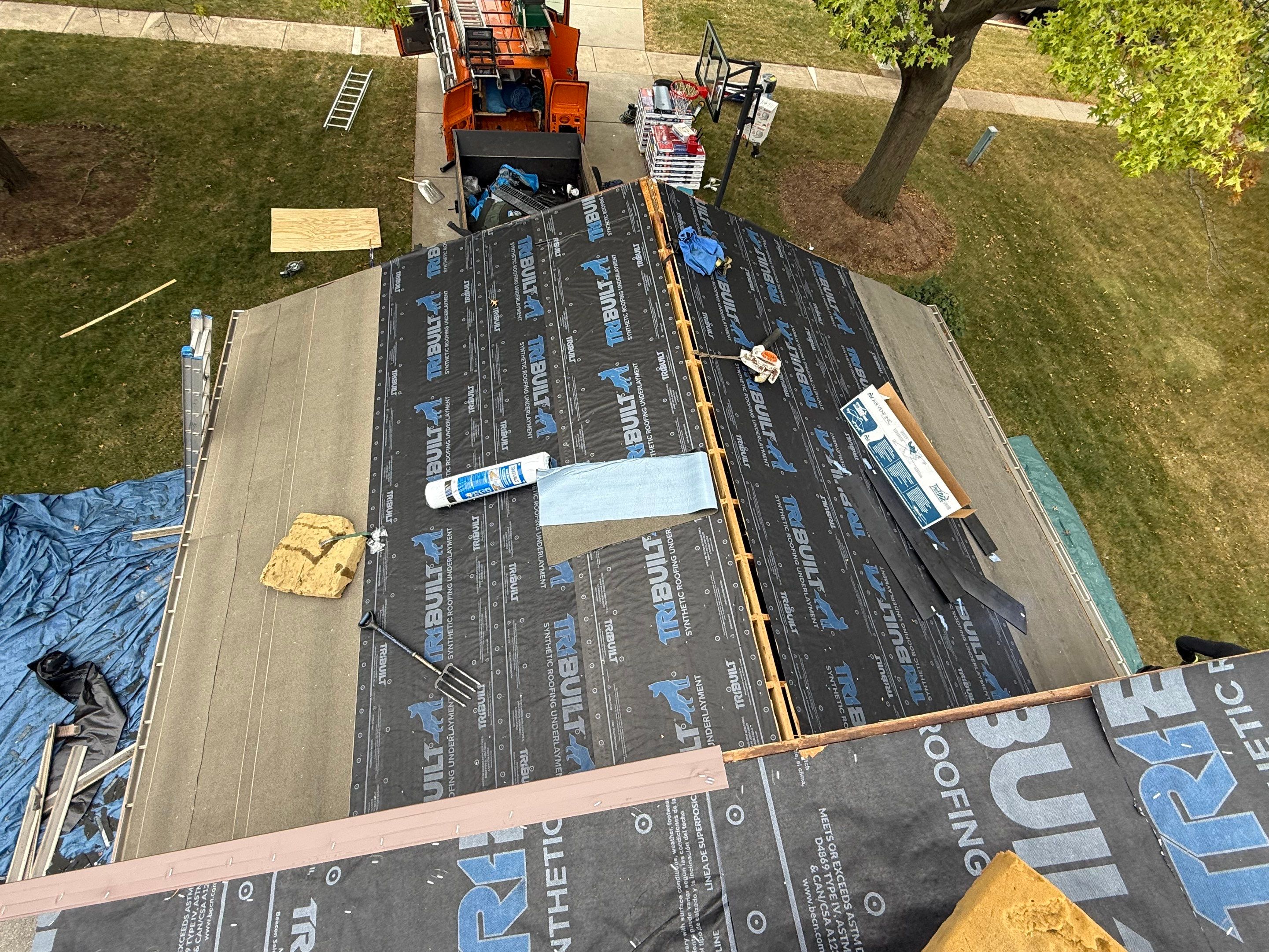 Roof & gutters by Optimal Home Improvement 