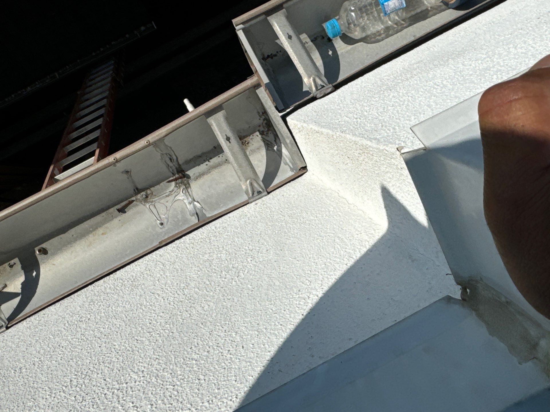 Scupper Repair Wall Leak by Associates Roofing Unlimited 