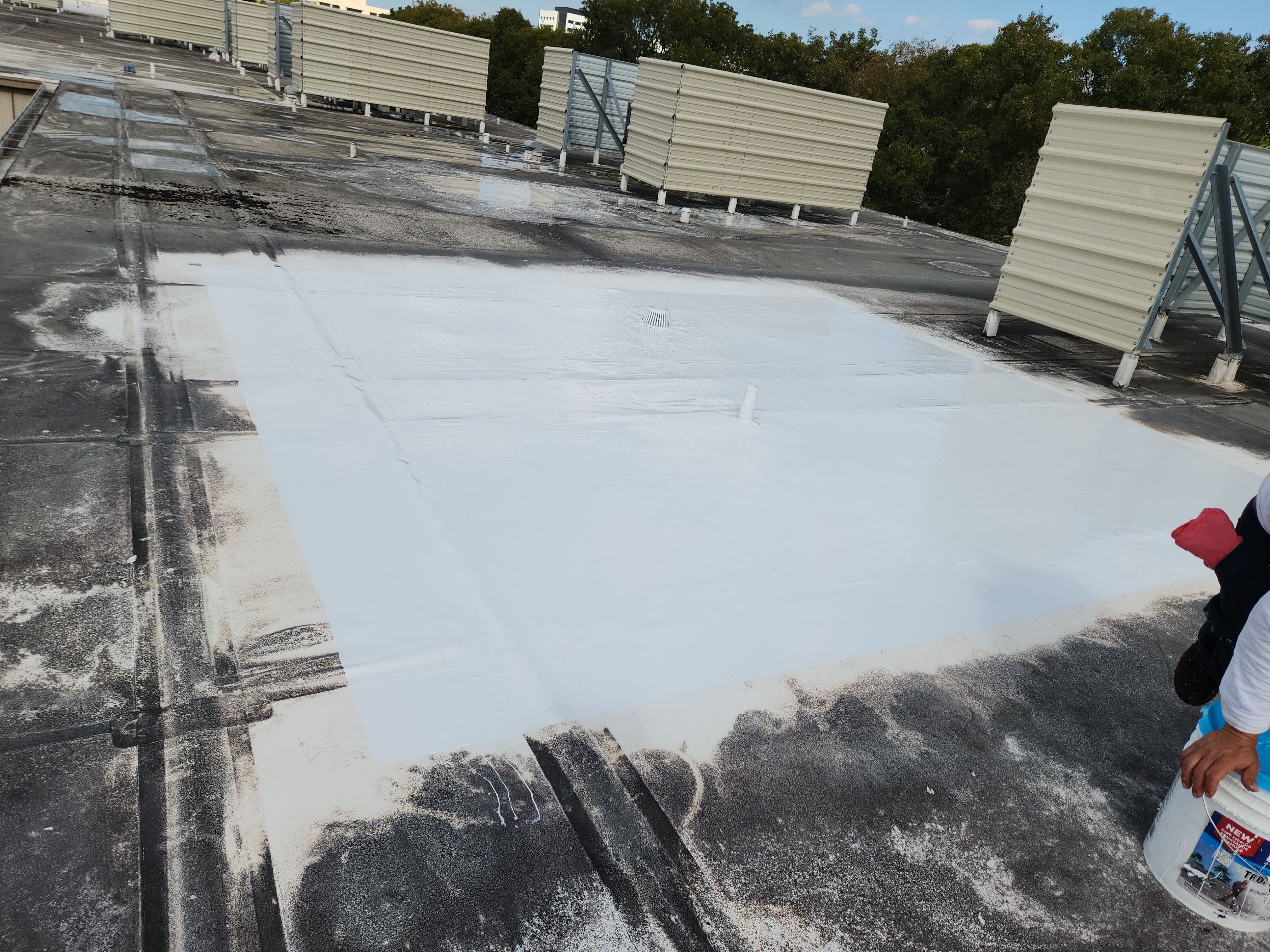 Reflective Silicone Roof Coating and Maintenance in Palm Beach Gardens by Aastro Roofing