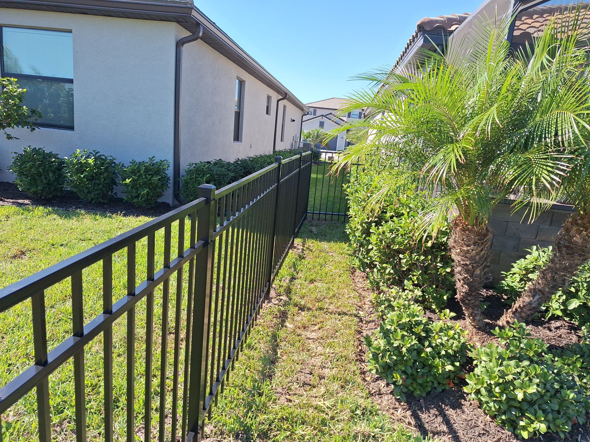 Aluminum Fence Installation using 4ft 3 Rail Black Aluminum Fence by Asap fence and gates, LLC
