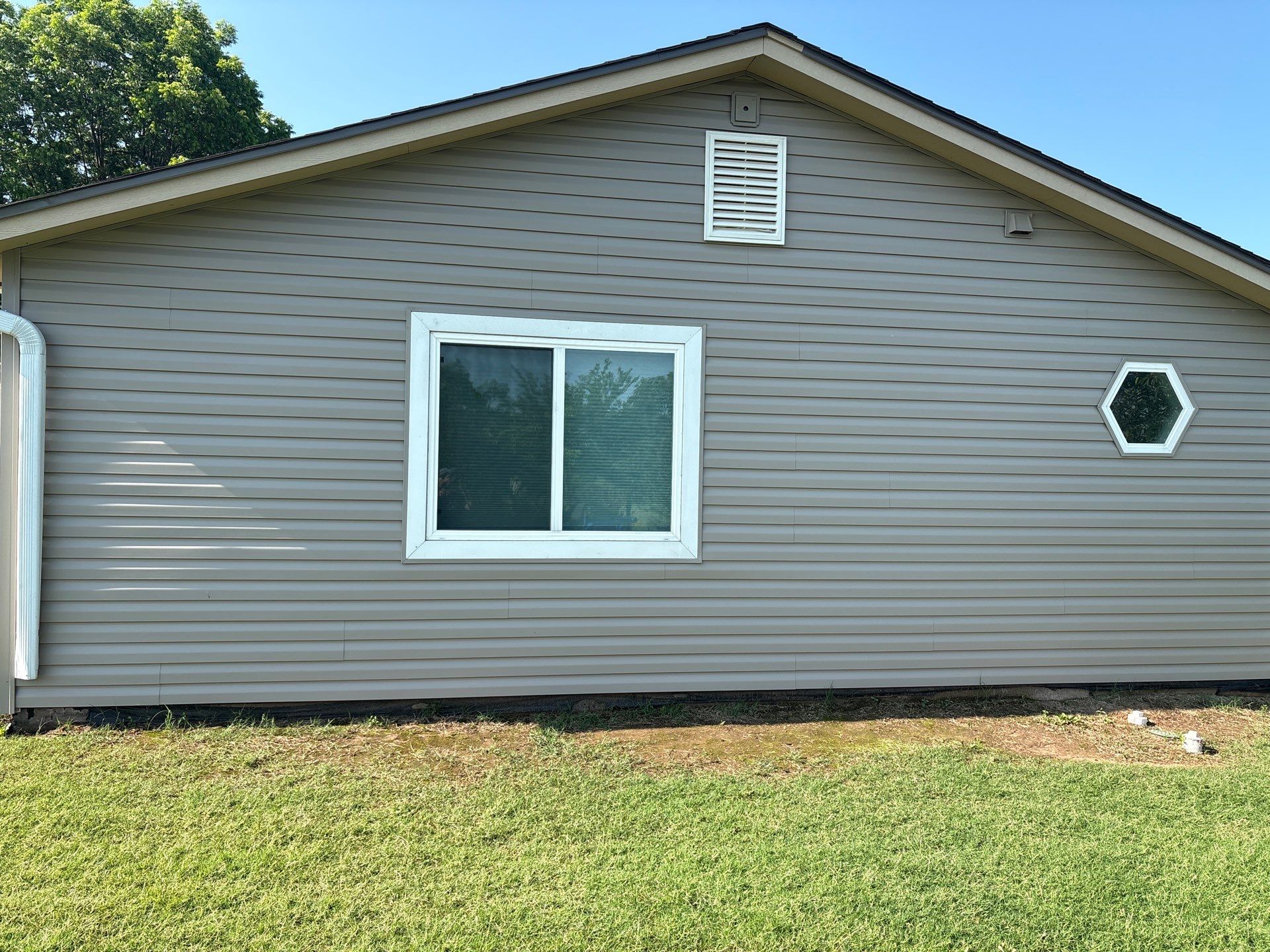 siding replacement in Guthrie by McCann's Roofing and Construction