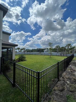 Aluminum Fence Installation using Black 3 Rail Aluminum Fence
