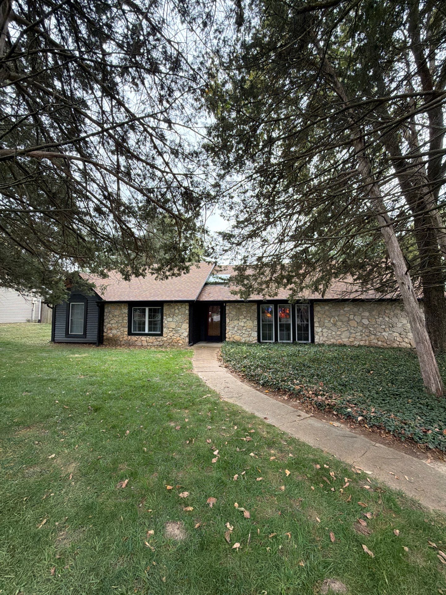 Wood siding refresh by Pezley Painting