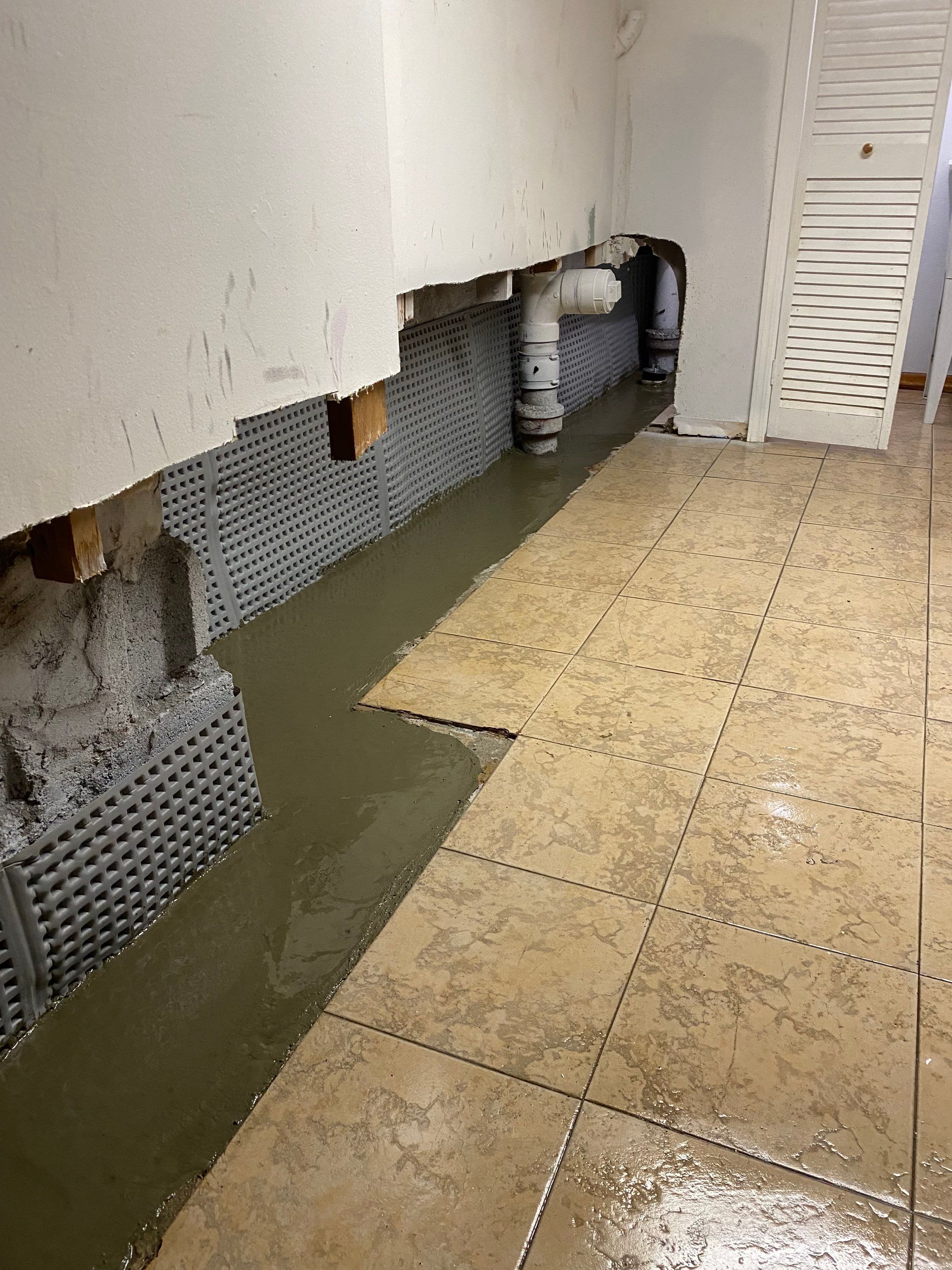 Interior French Drain Job in Bayonne, NJ by Pure Service Pro, LLC 