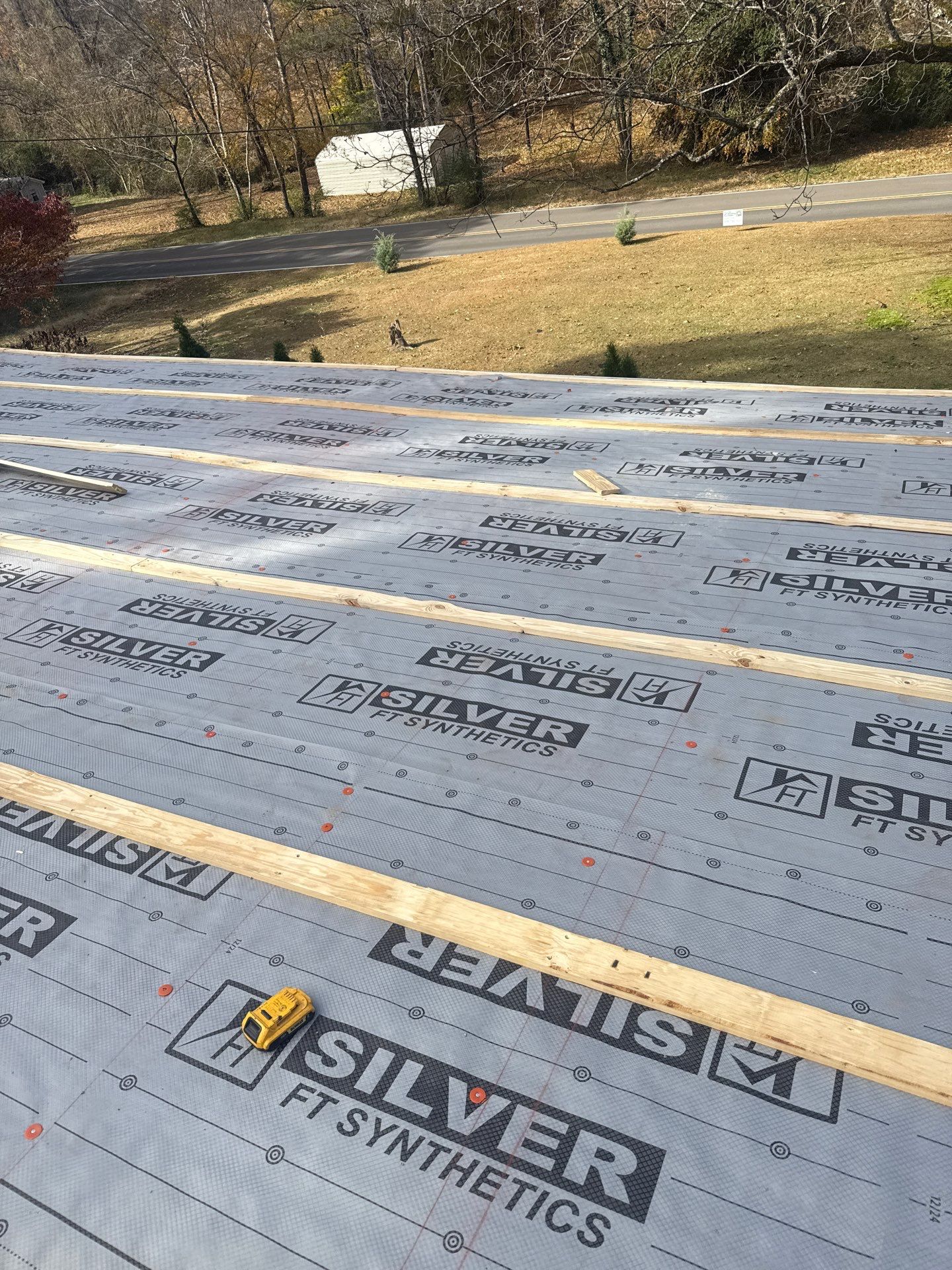 Roof Replacement in Pinson (Metal Roof) by The Roofing Dudes