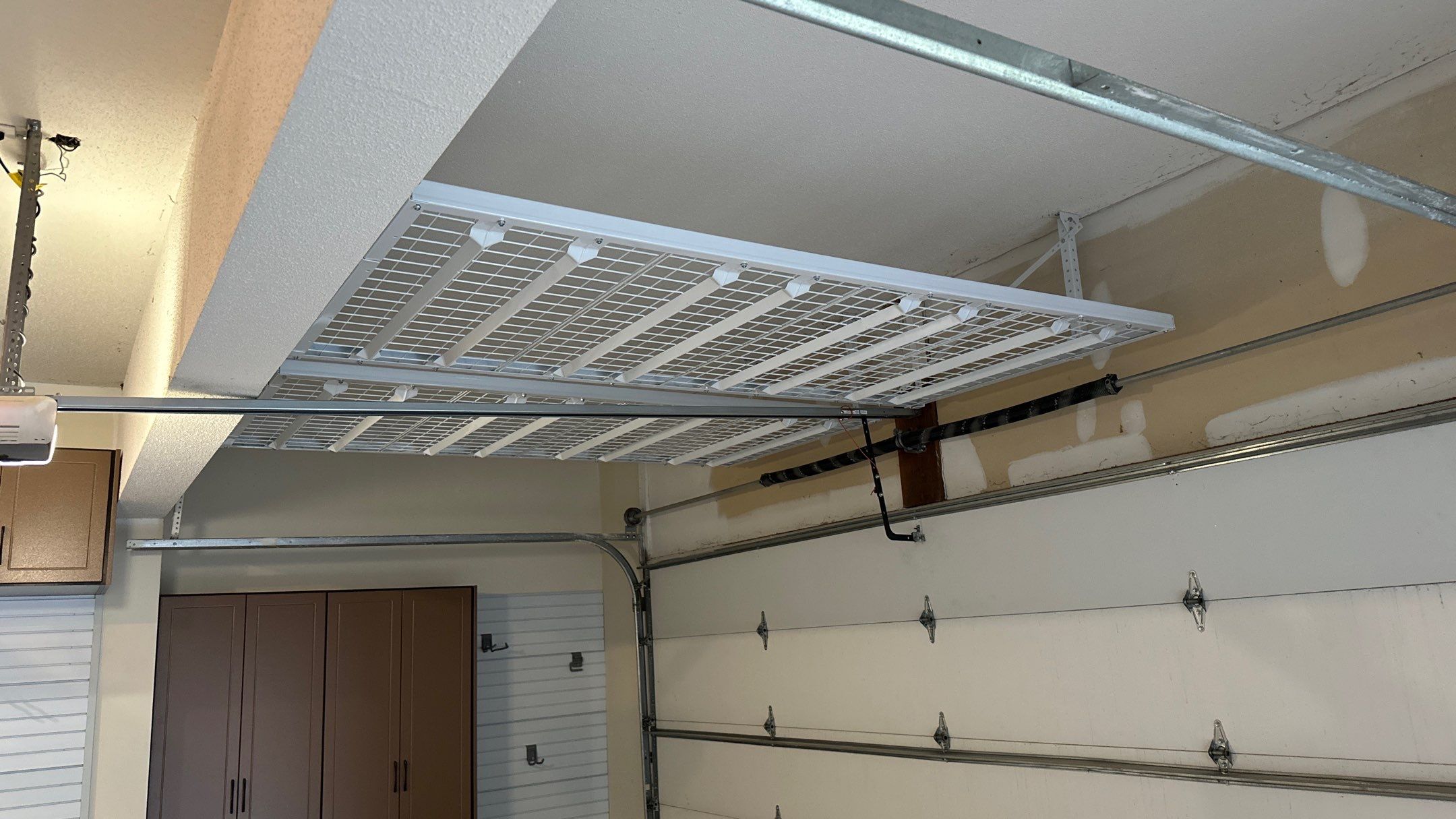 Jake P upgraded his garage with brand new cabinets and a new floor  by Banner Garage