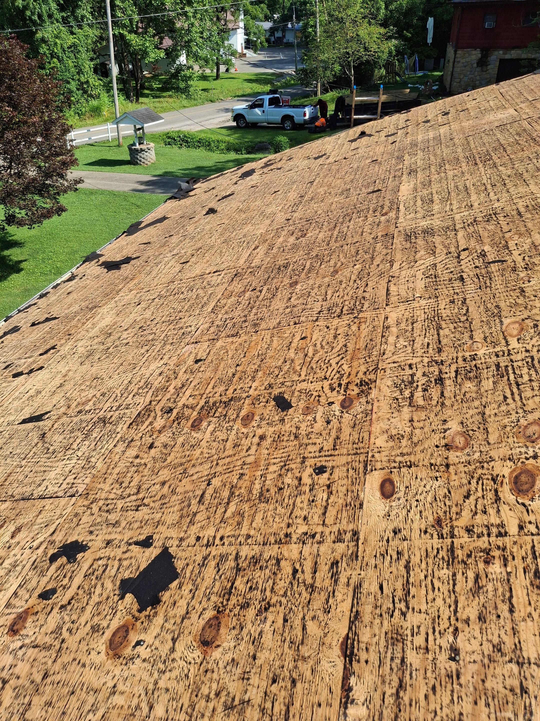 Residential Roofing Installation using GAF Timberline HDZ Charcoal by Rainstoppers Roofing