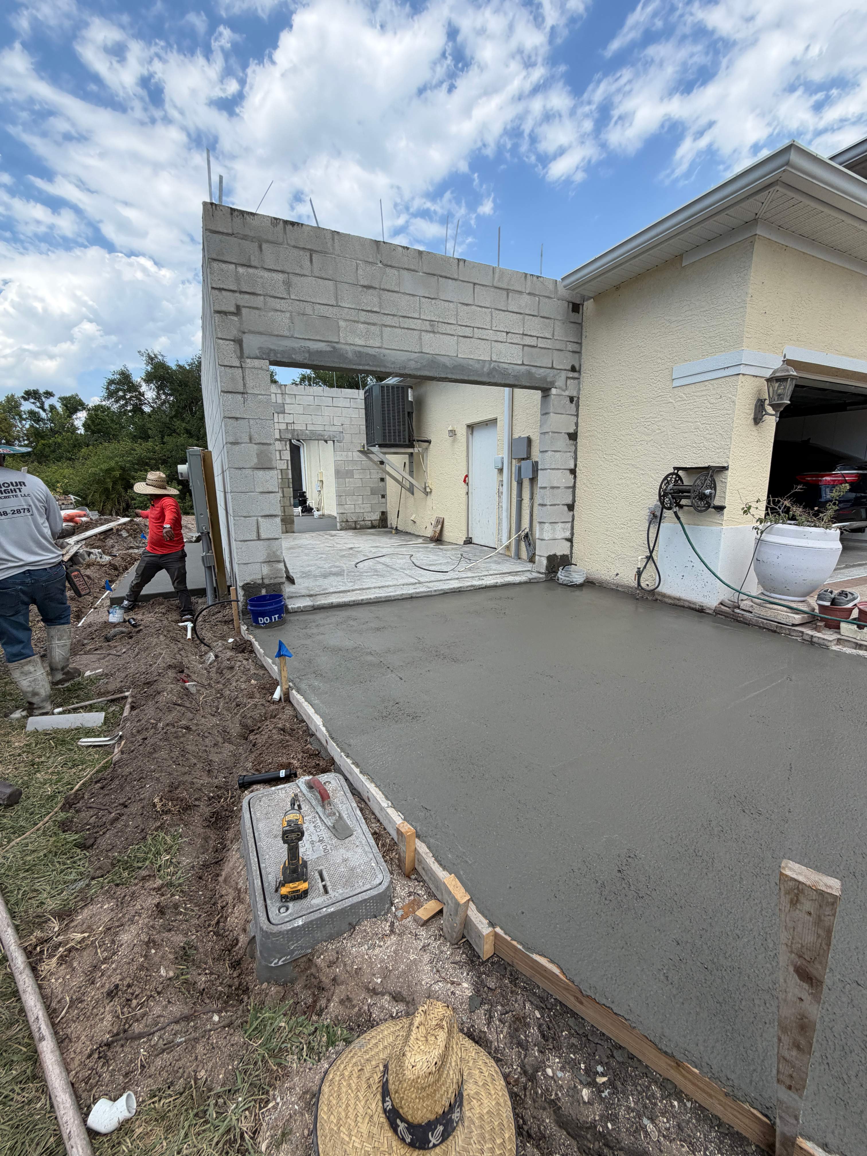 Custom Single-Car Garage Addition and Lanai Cage in Bradenton by Vertical General Contracting 