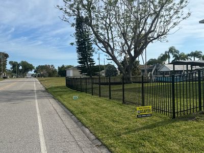 Aluminum Fence Installation using Black 3 Rail Aluminum and Vinyl Privacy Fence 