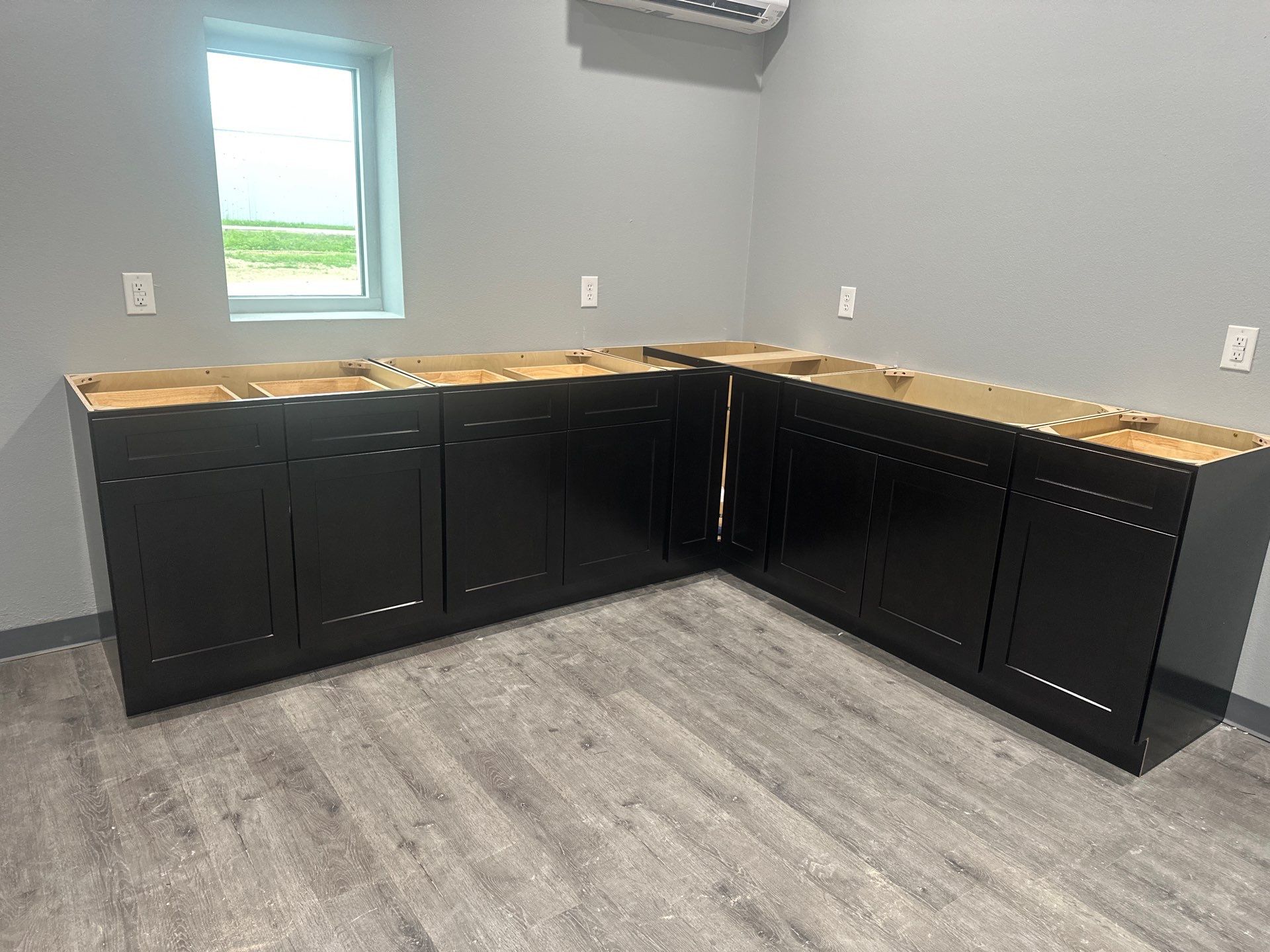 Commercial Efficiency: Warehouse Kitchen & Guest Area Cabinet Installation by Tibi Soli LLC