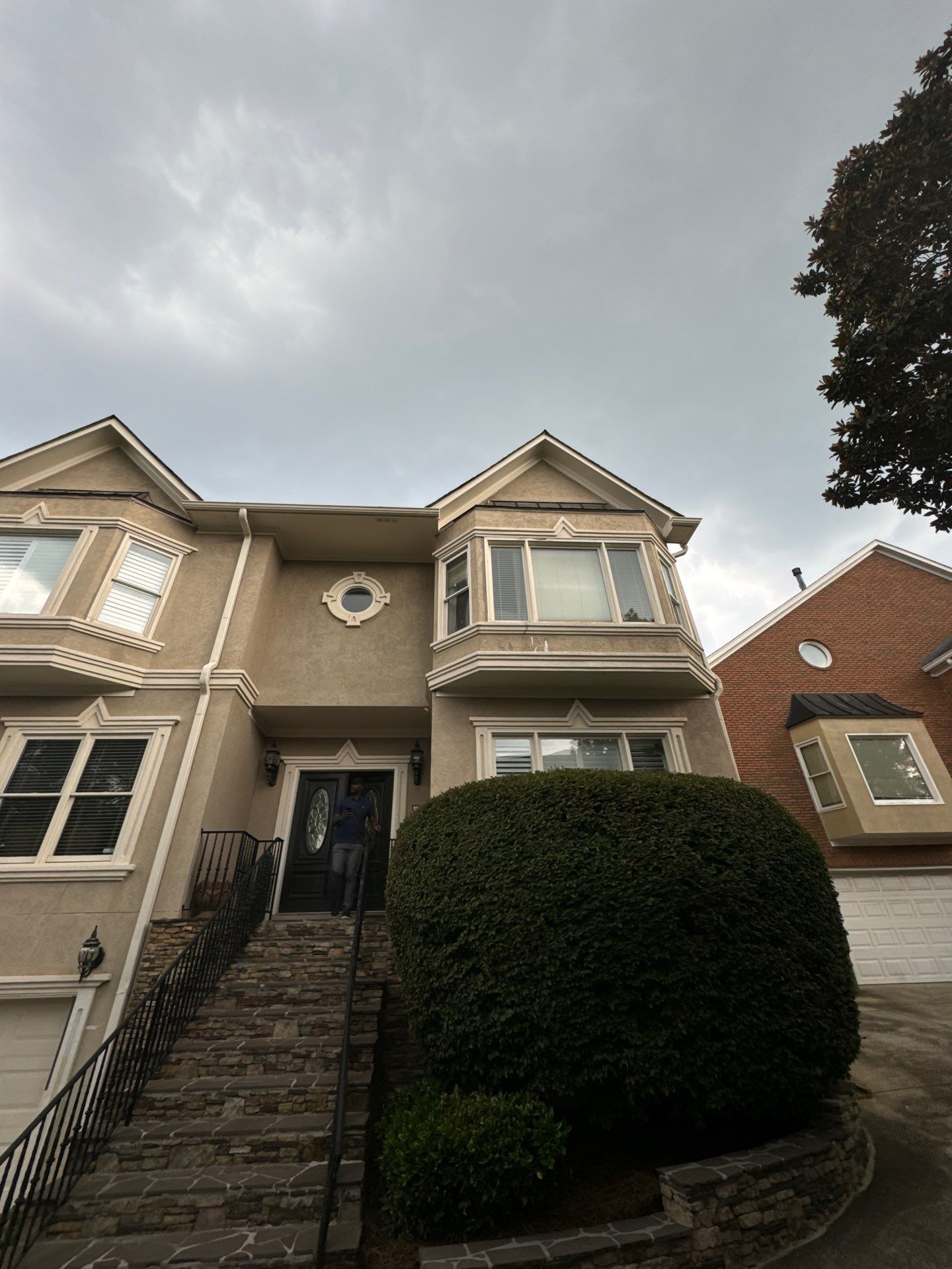 Full Exterior Stucco Painting and Wood Deck Staining in Atlanta by Swift Home Renovations