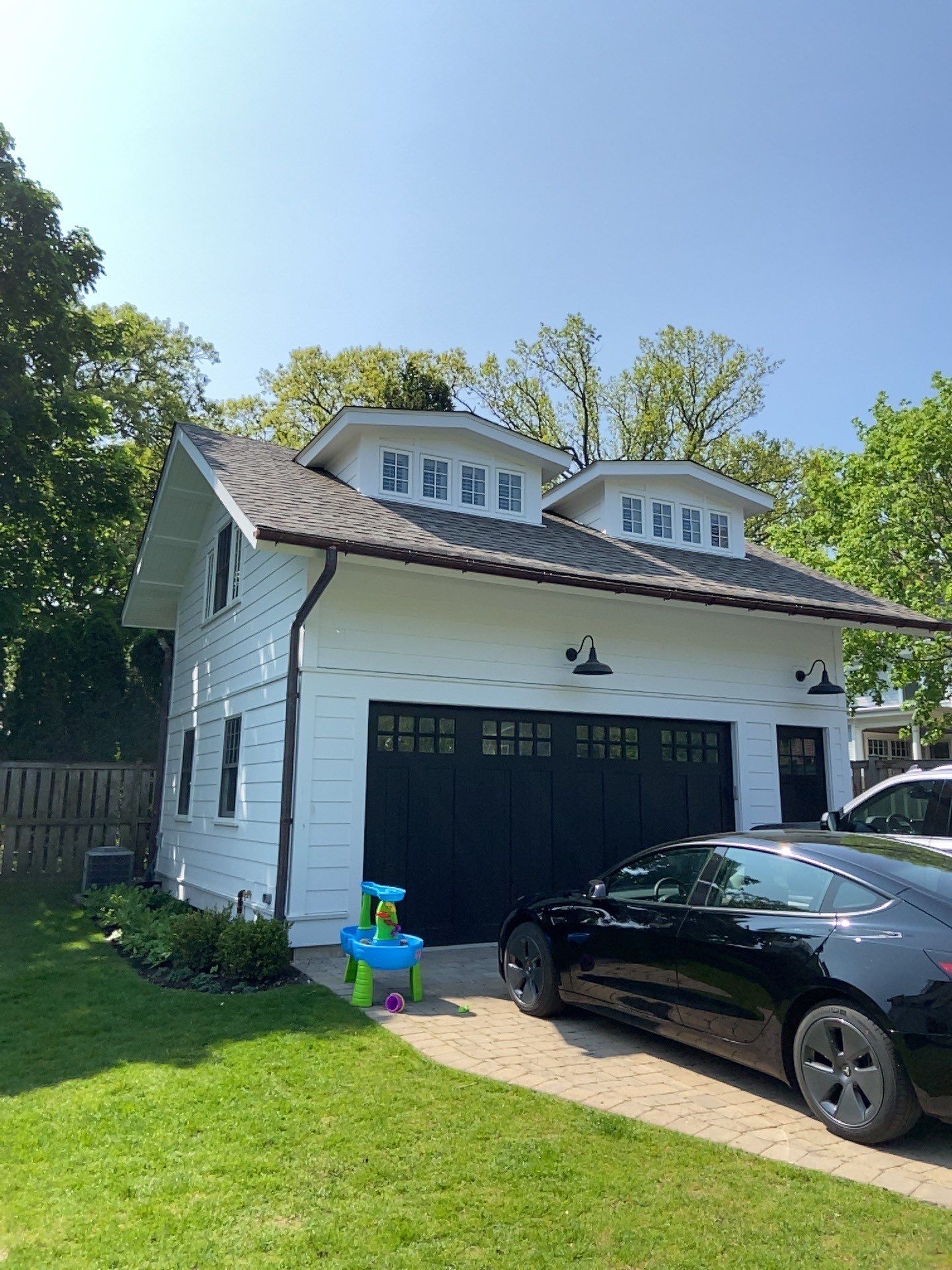 Asphalt Roof Replacement with Half Round Copper Gutter Installment by Custom Installations