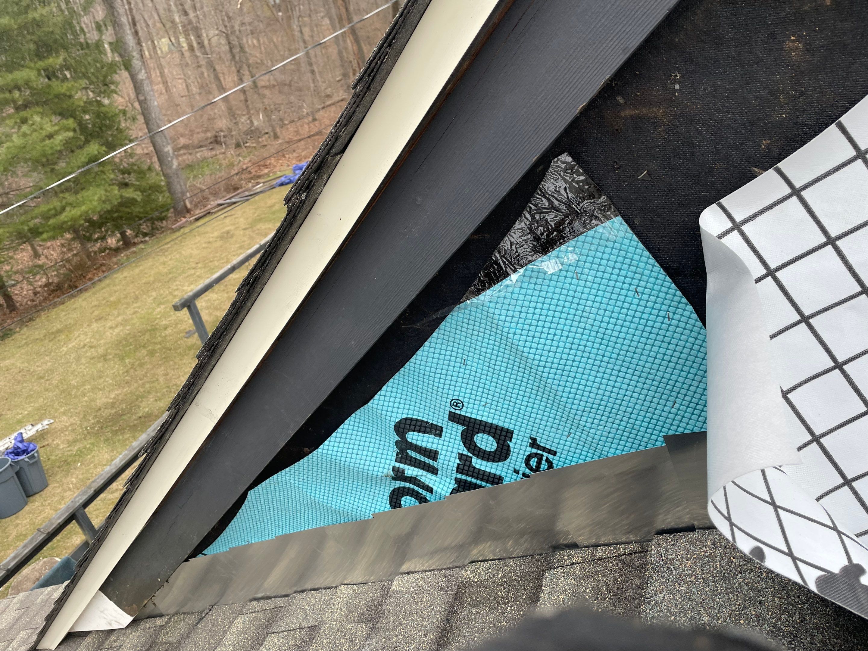 Asphalt shingles meet sleek siding in Guilford. by DiGiorgi Roofing and Siding Inc