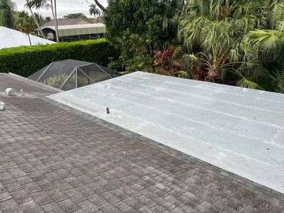 Florida Room Flat Roof Replacement using Hot Mopped Granular Cap Sheet.