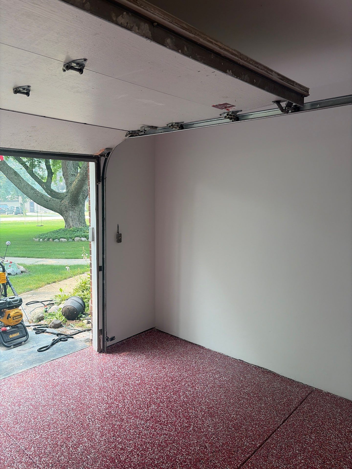 Bayside Garage Interior Remodel with Custom Epoxy Floor Coating by OCS Contracting Services