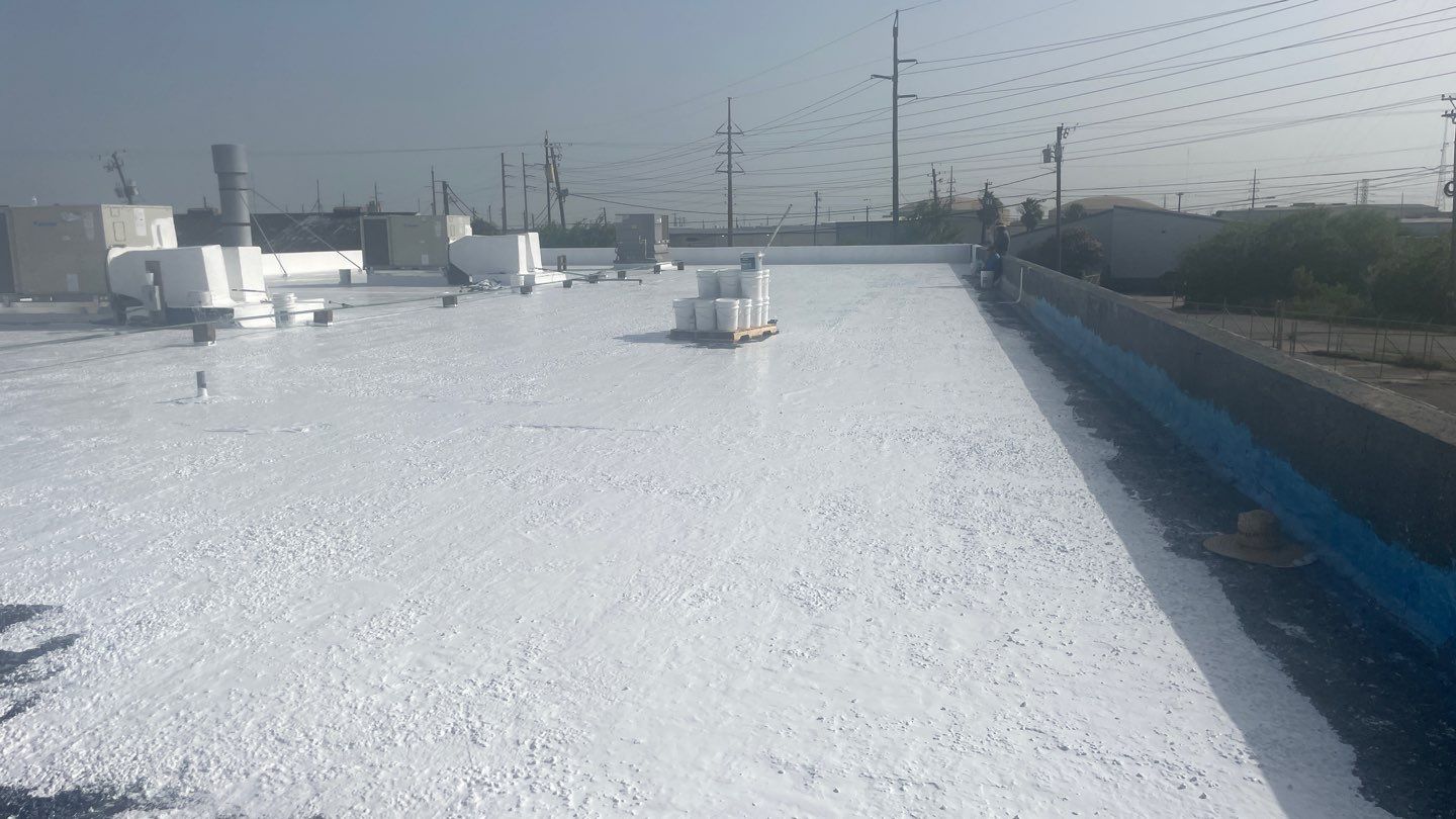 Dirty leaking Gravel Roof by Bayfront Roofing and Construction