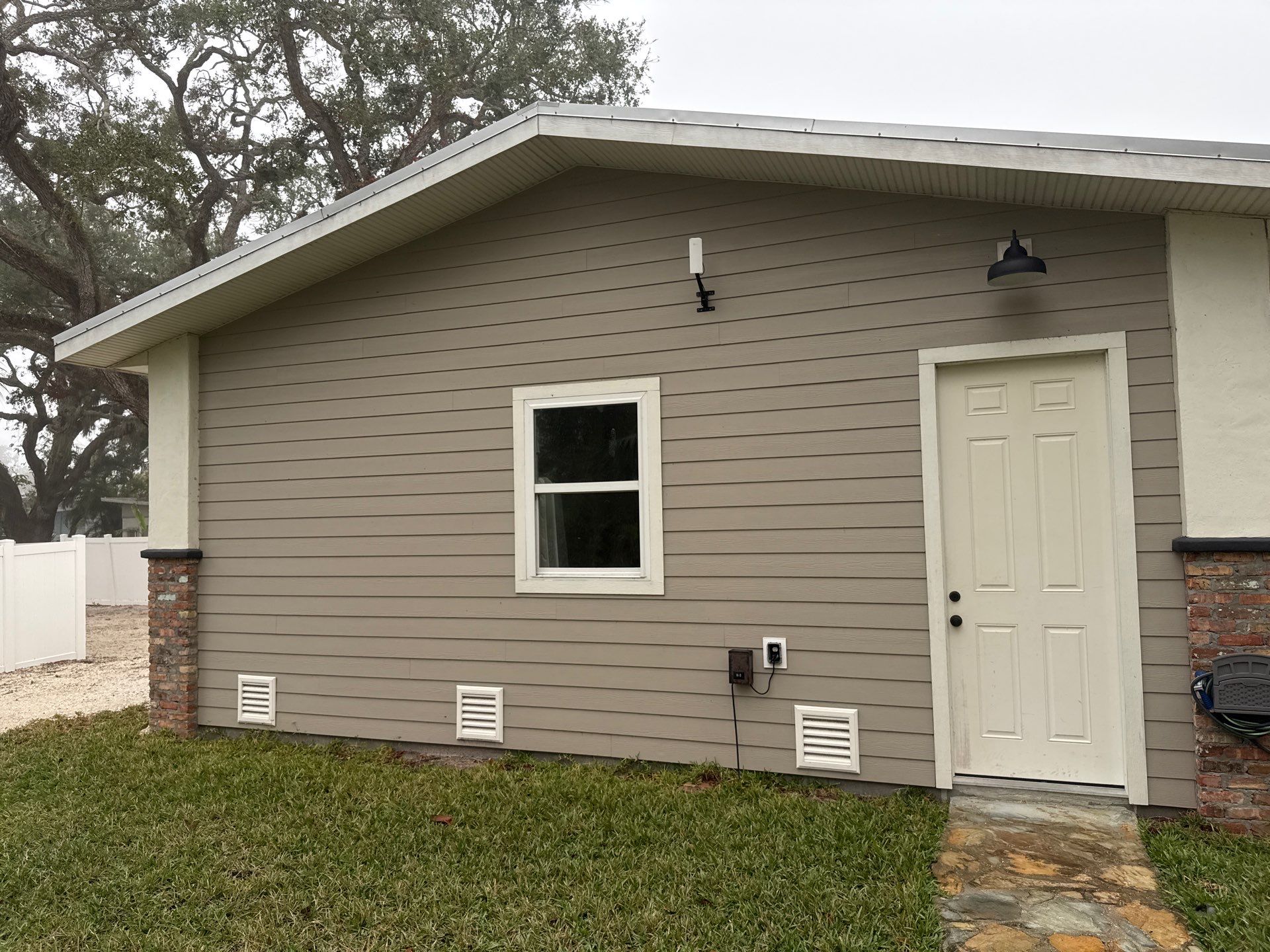 2-Story House Wash and Garage Pressure Washing in Palmetto, FL by Sunshine AquaWash