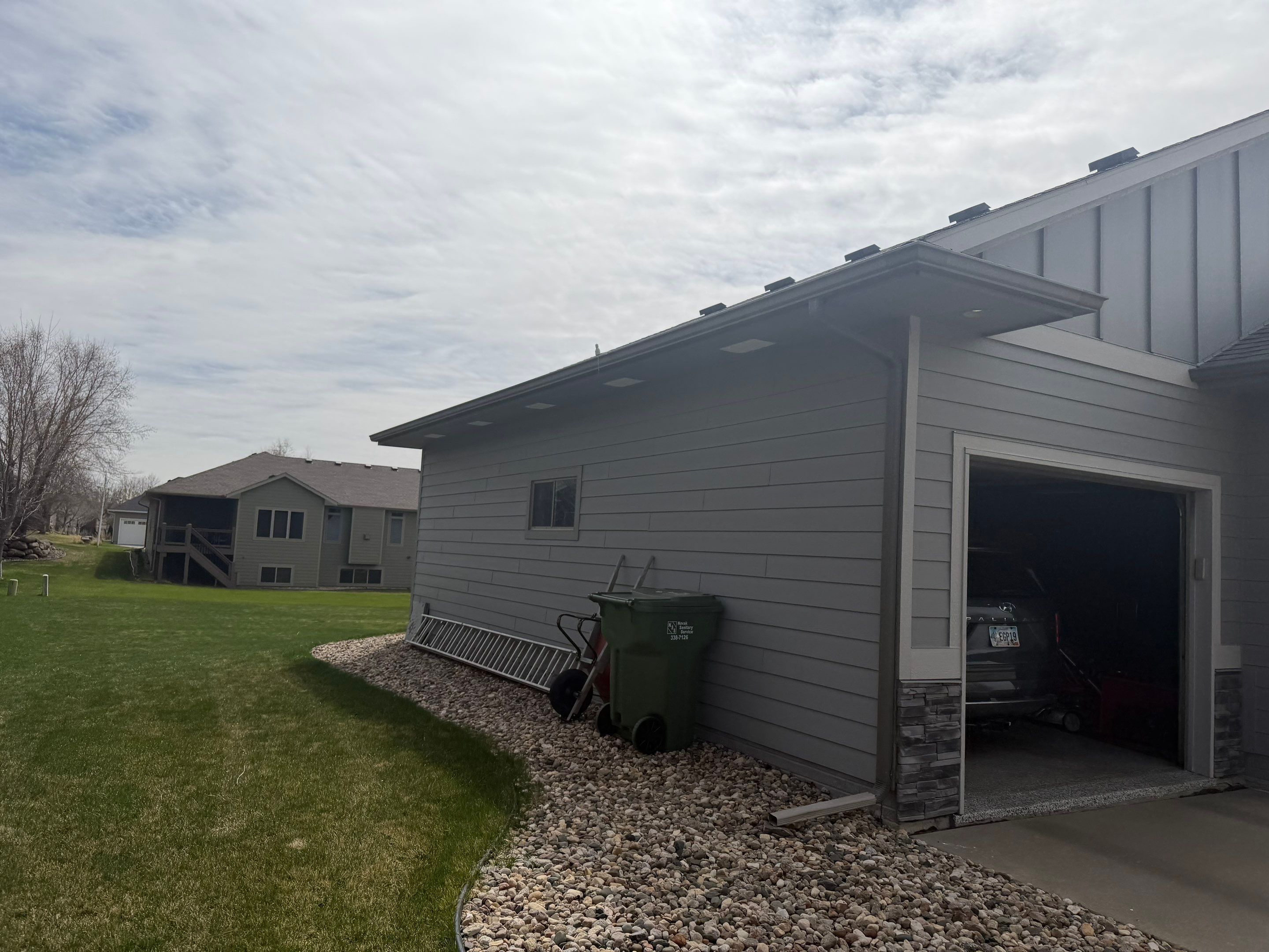 Residential Exterior Painting and Siding Maintenance in Sioux Falls by Select Painting, Coatings & Garage Cabinets