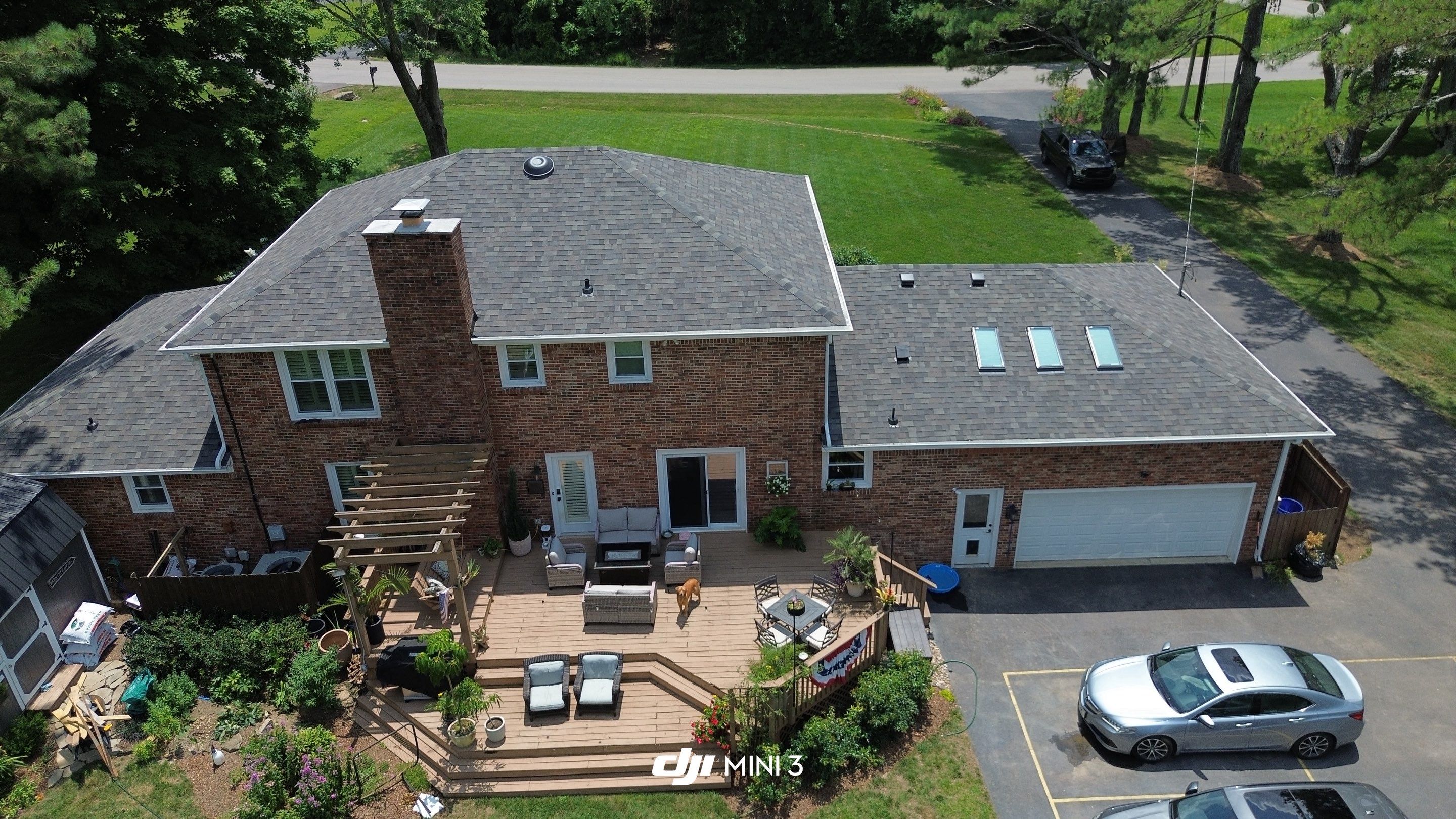Full Roof Replacement and Skylight Installation for Franklin Colonial Home by Shinglesmiths Roofing