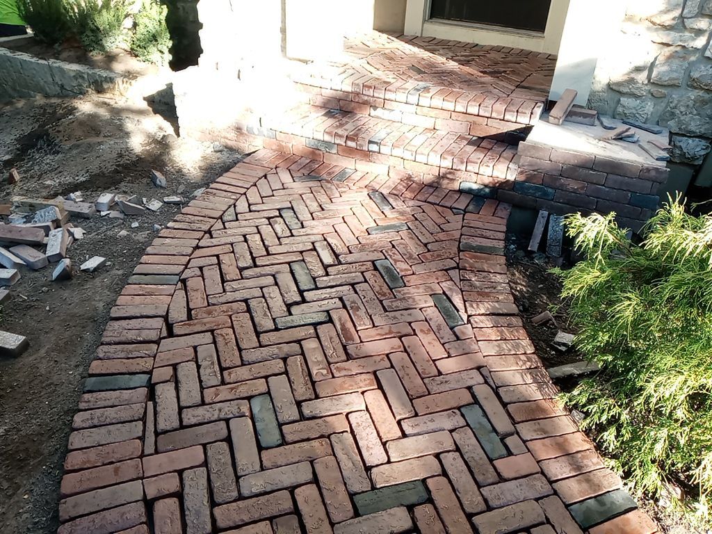 New Driveway and Sidewalk by LAND ESCAPES LLC