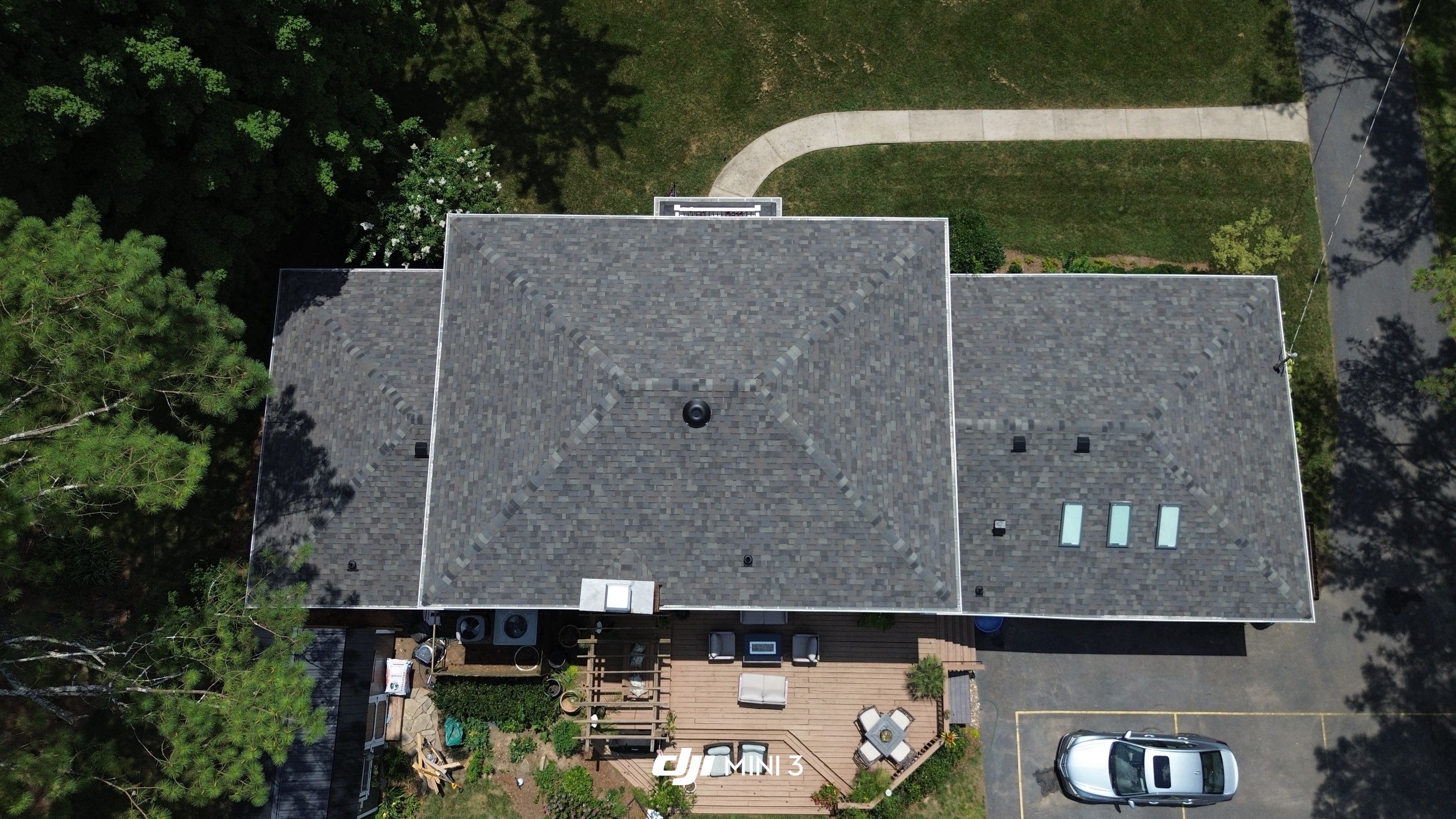 Full Roof Replacement and Skylight Installation for Franklin Colonial Home by Shinglesmiths Roofing