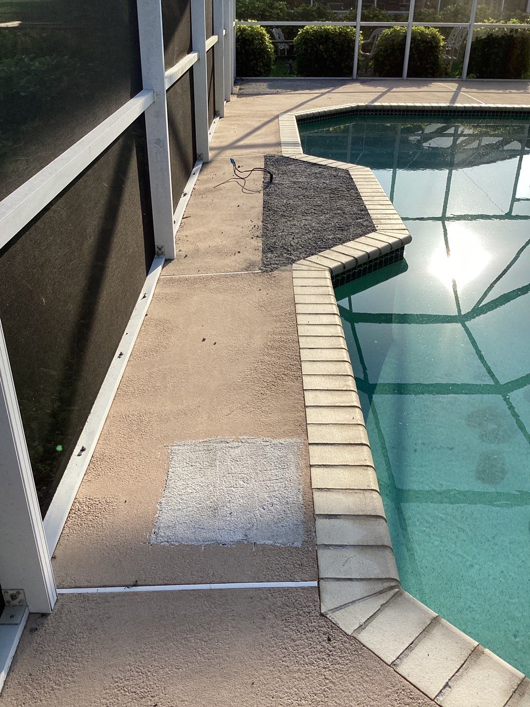 Patio using Pebble Beach by Amvet concrete coatings llc