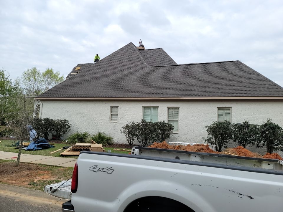 Residential Roofing Installation using Roof Replacement by American Roofing & Construction LLC