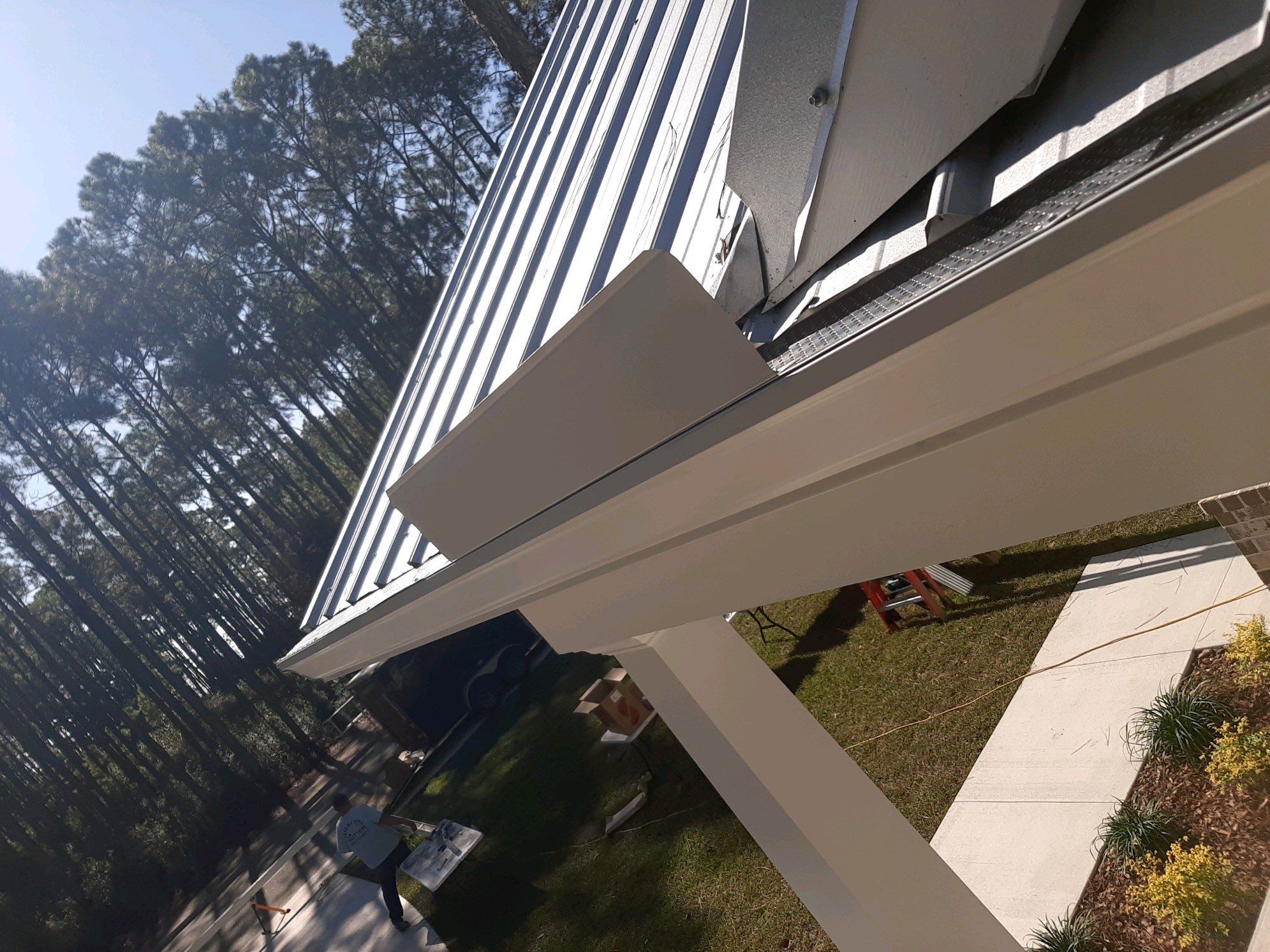 Gutter Installation using K-Style Seamless Gutters and Gutter Guards by Gutter Professors