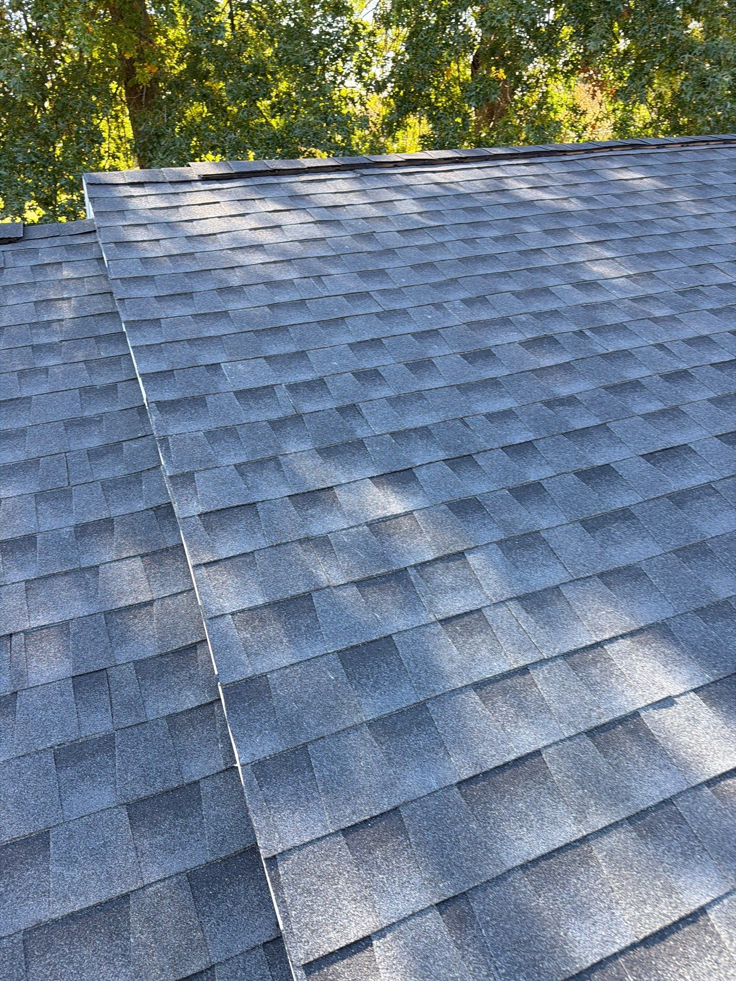 Residential Roofing Installation using GAF Timberline HDZ Charcoal by Rainstoppers Roofing