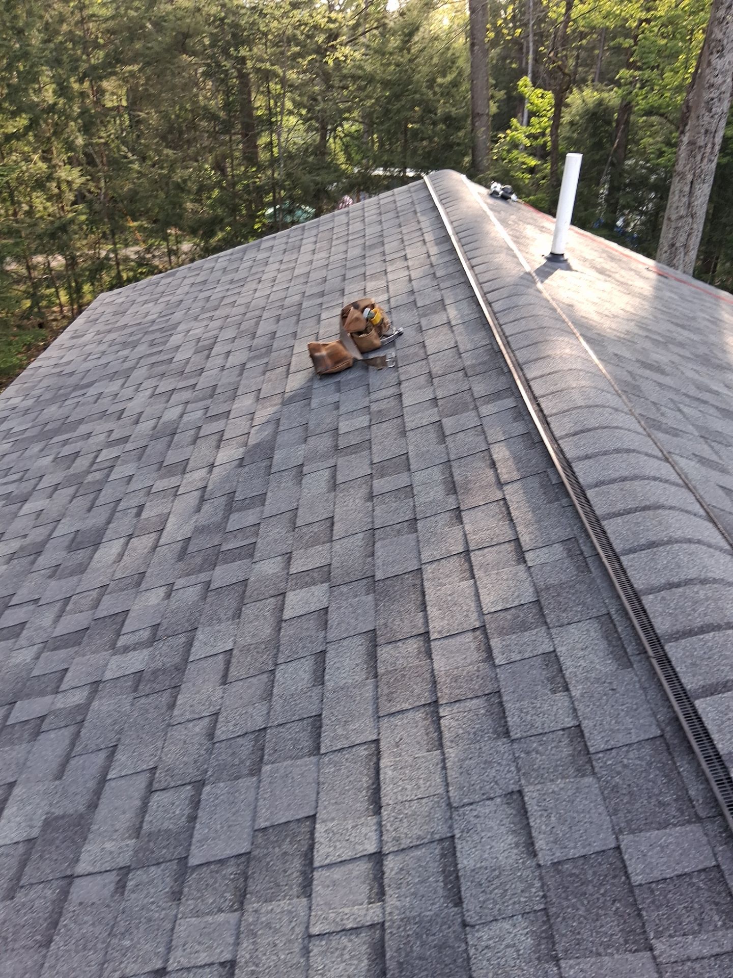 Asphalt Shingle Roof Replacement and Skylight Installation in Newport, NH by Tall pine roofing