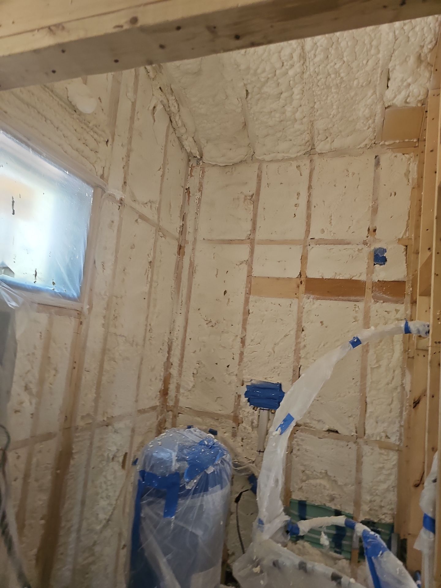 Spray Foam Insulation using open cell spray foam by NYS Foam & Energy