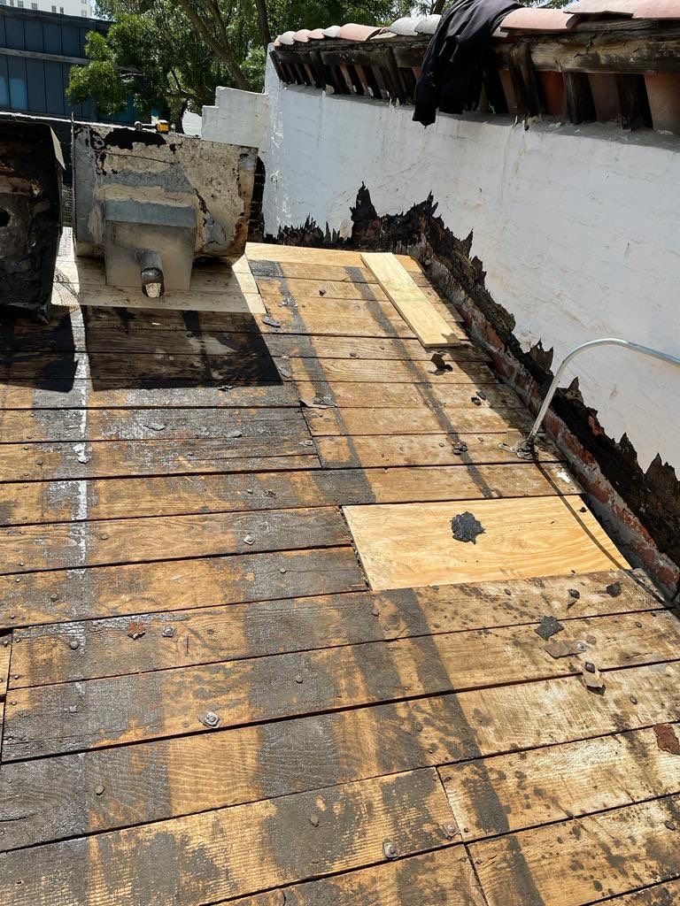 Commercial Roofing Installation using Conklin BenchPly system with PUMA top coat (imbedded fabric system) by Straight Edge Roofing Inc