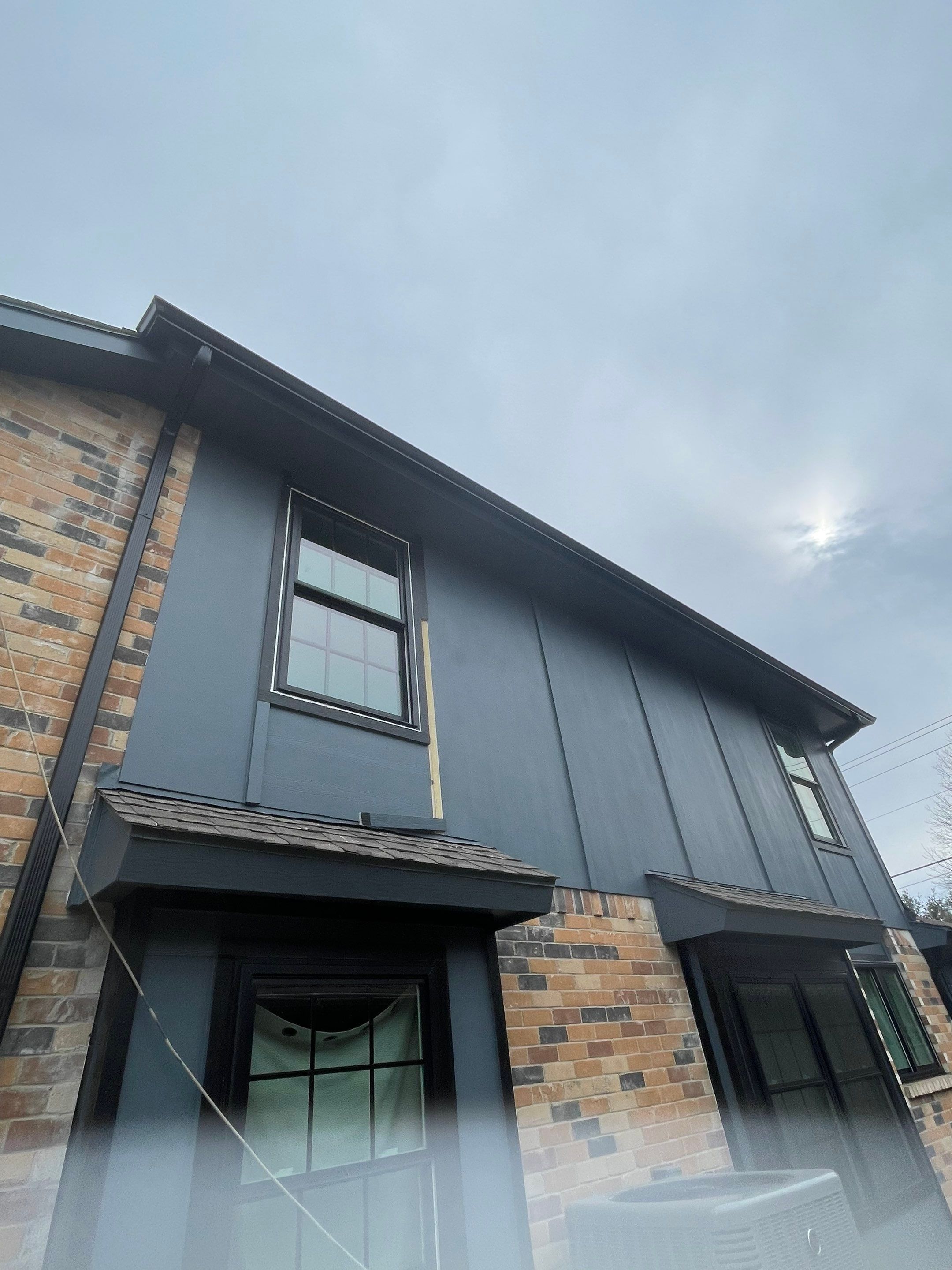 Windows and Exterior Paint by Rhino Roofing and General Contracting, LLC
