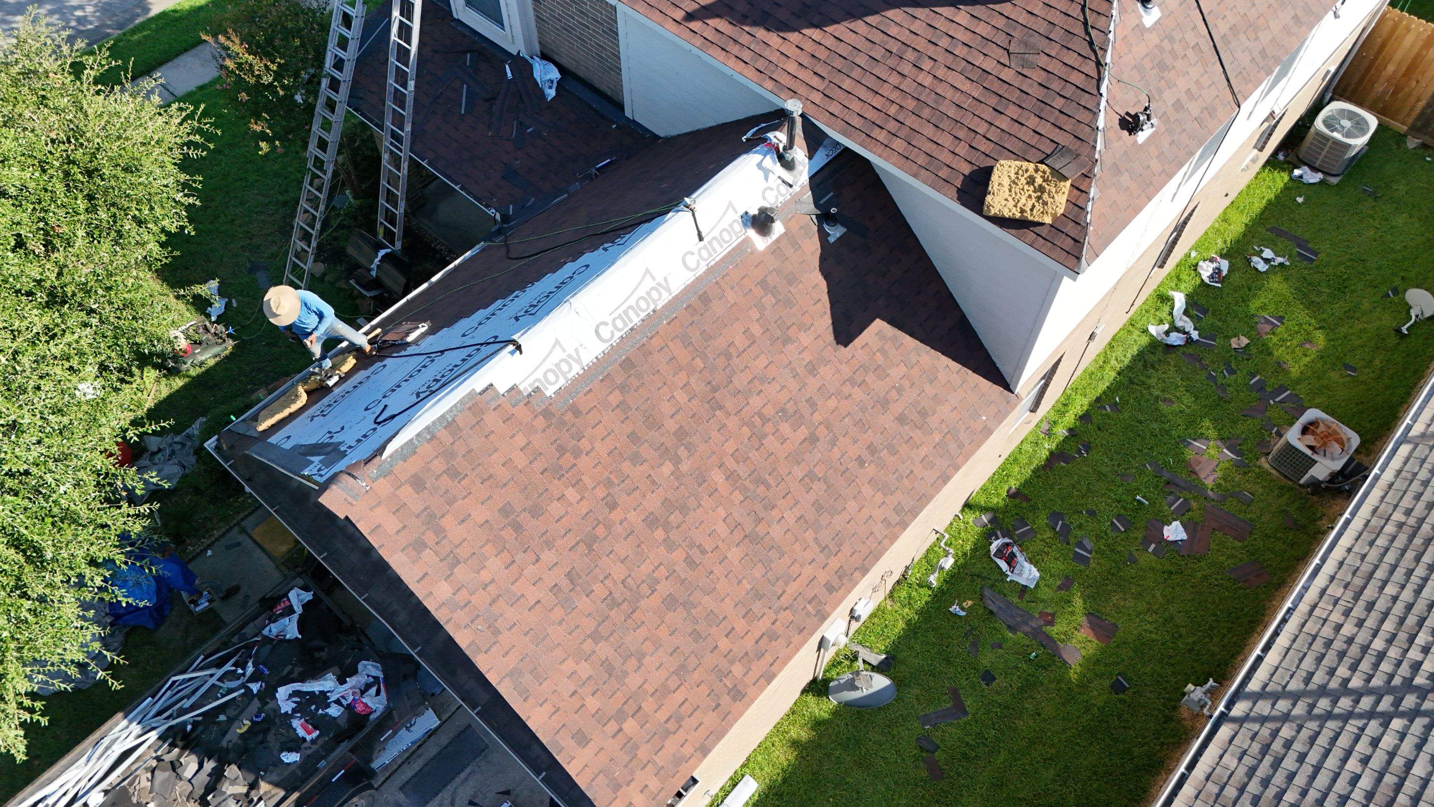 Full Roof Replacement in Warm Brown Tones — Spring, TX by PL Roofing & SB Roofing, LLC.