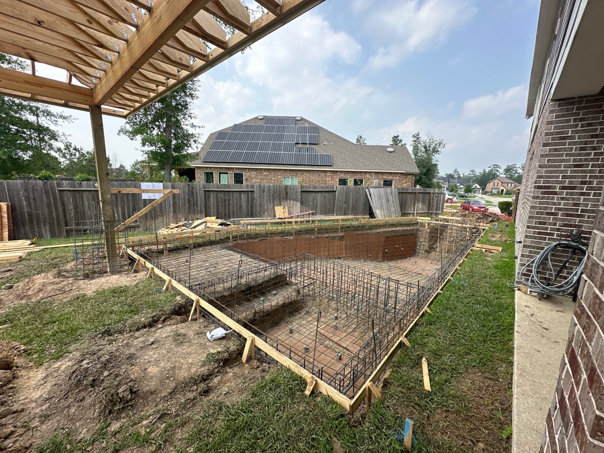 Covered patio and Summer Kitchen in Spring, TX by SophAlx LLC