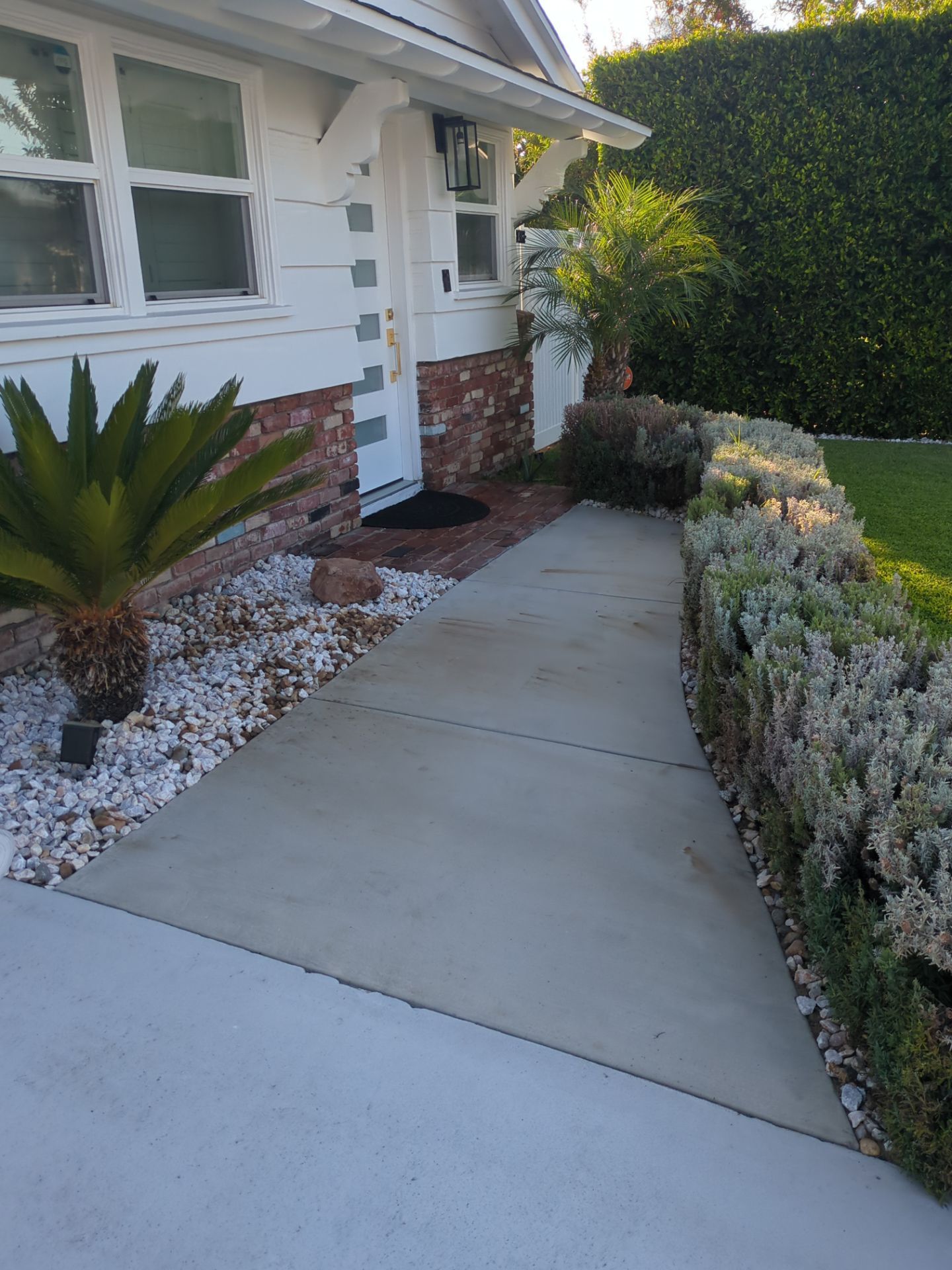 Sandblasting Paint Off Concrete Driveway In Downey, CA by La Power Washing Inc