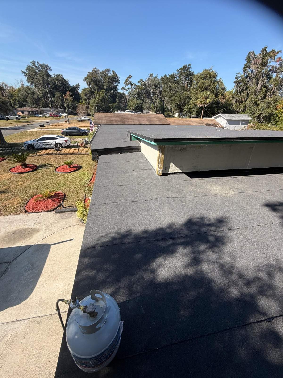 Flat Roof Renovation Due to Water Accumulation by urban green energy llc