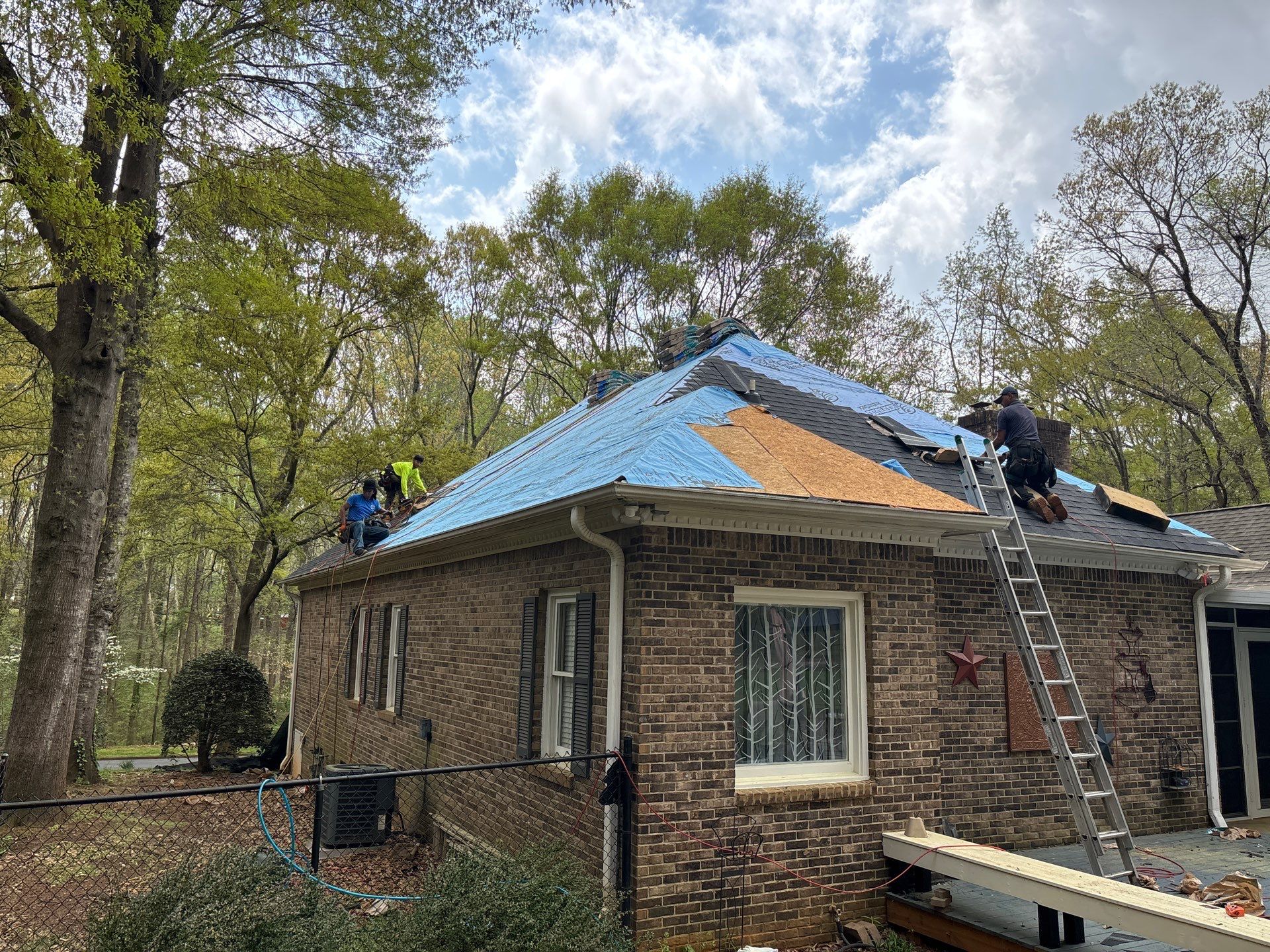 Spartanburg Residential Roof Replacement with Architectural Shingles and Skylights by Roofers LLC