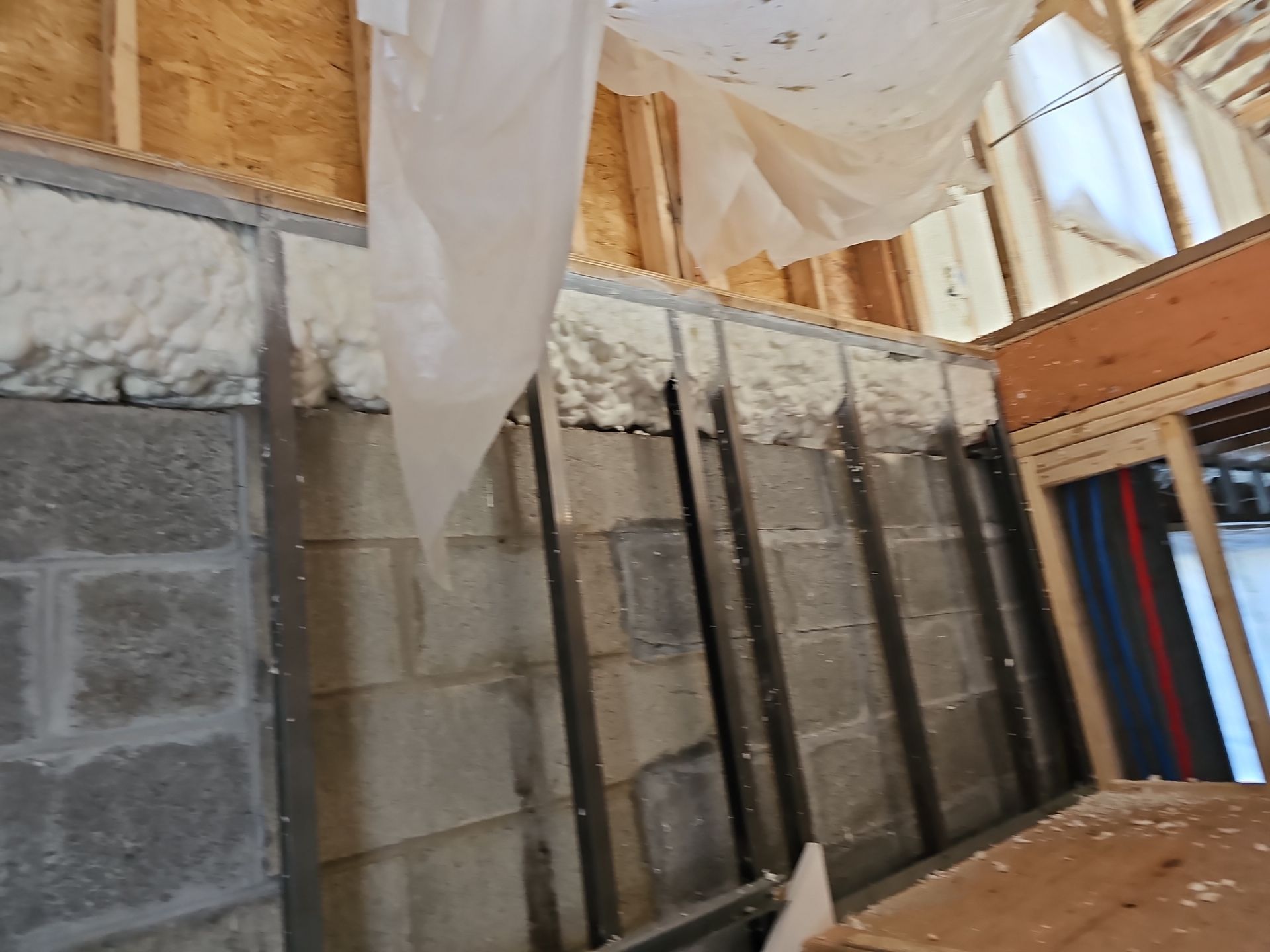 Basement Exterior Walls using Closed Cell Spray Foam by NYS Foam & Energy