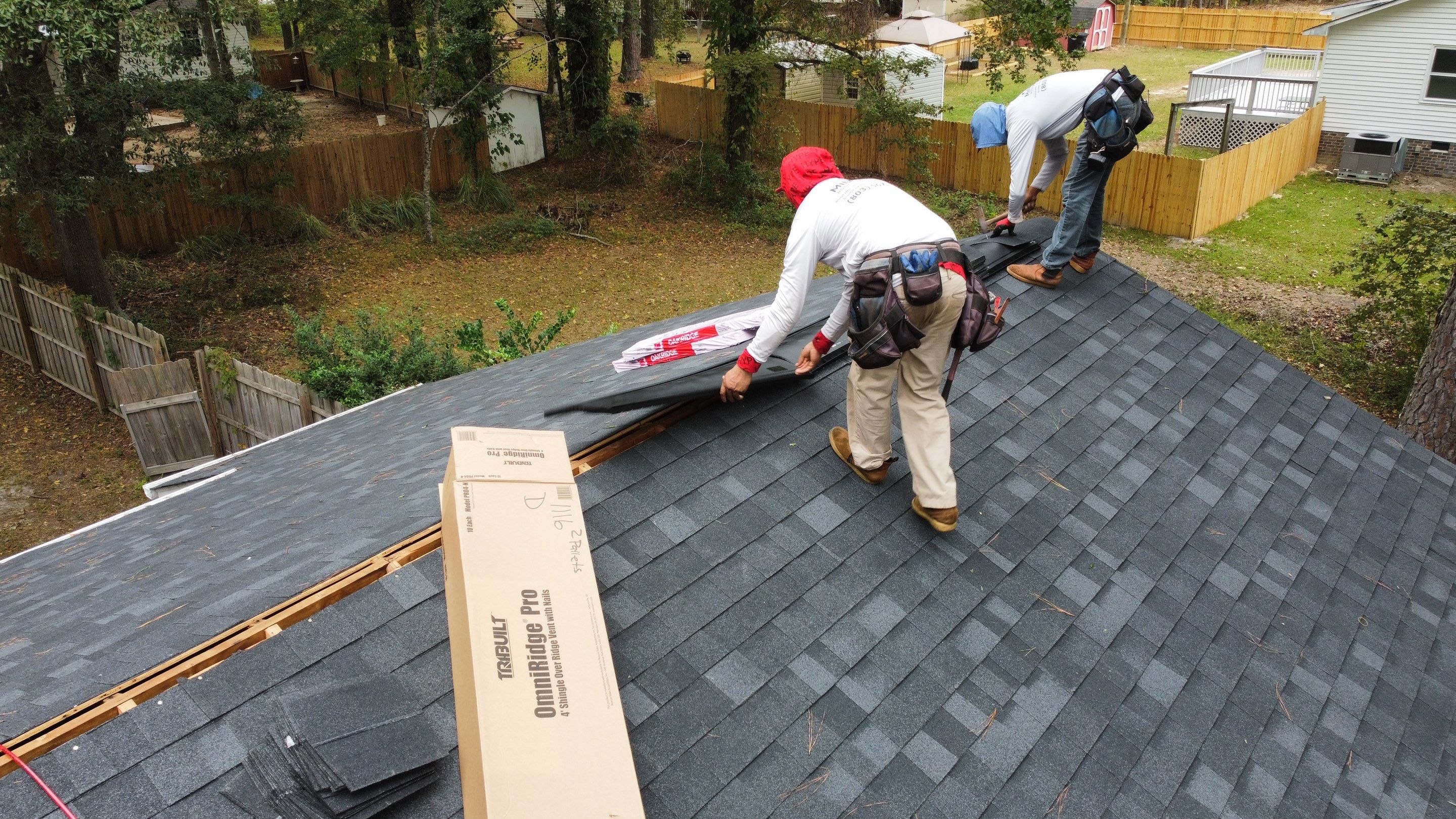 New Onyx Black Shingle Roof Replacement and Tree Damage Repair. by Midlands Roofing & Exteriors