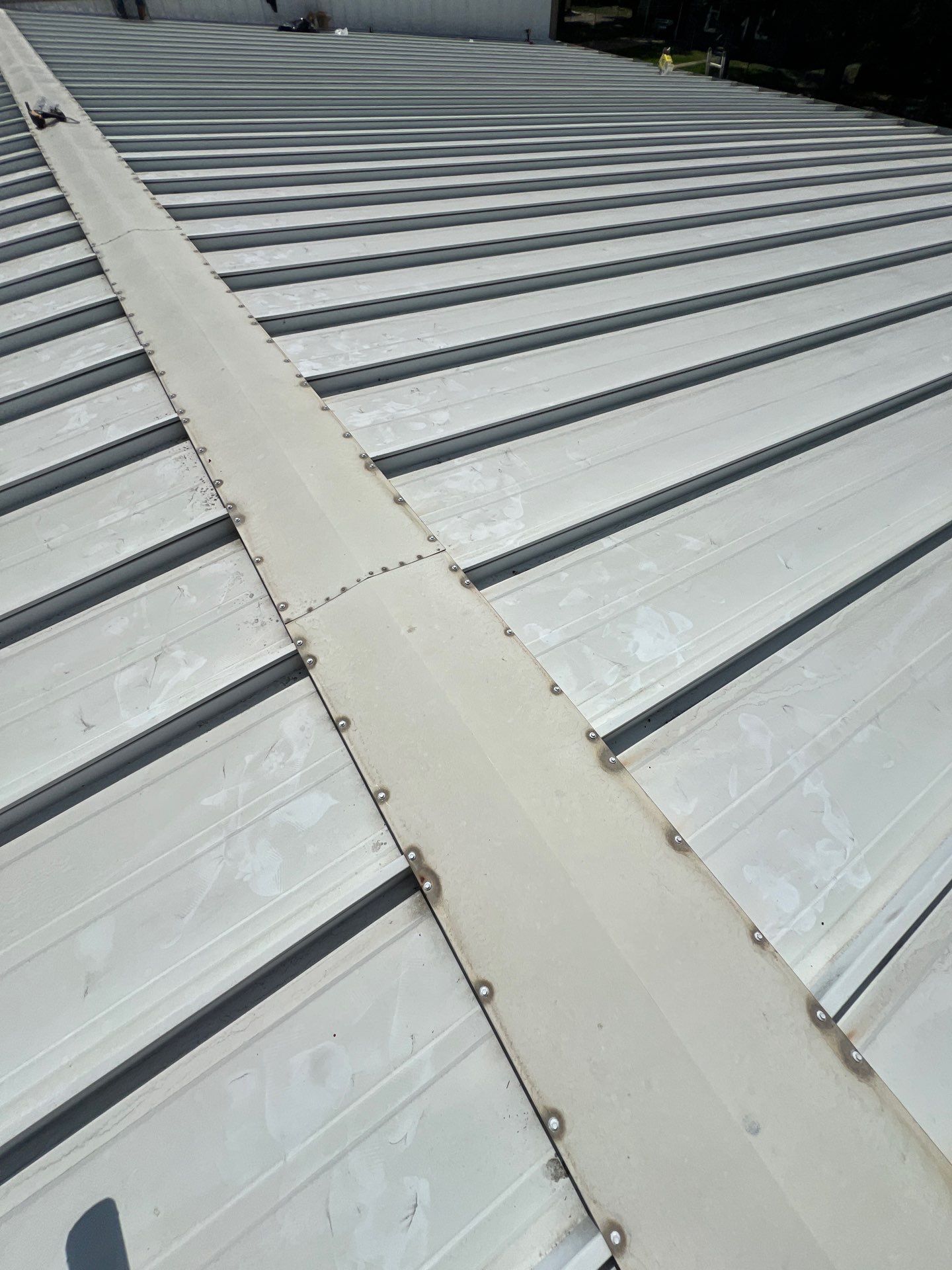 Commercial Roofing Repair using Metal by Roof Repair Company