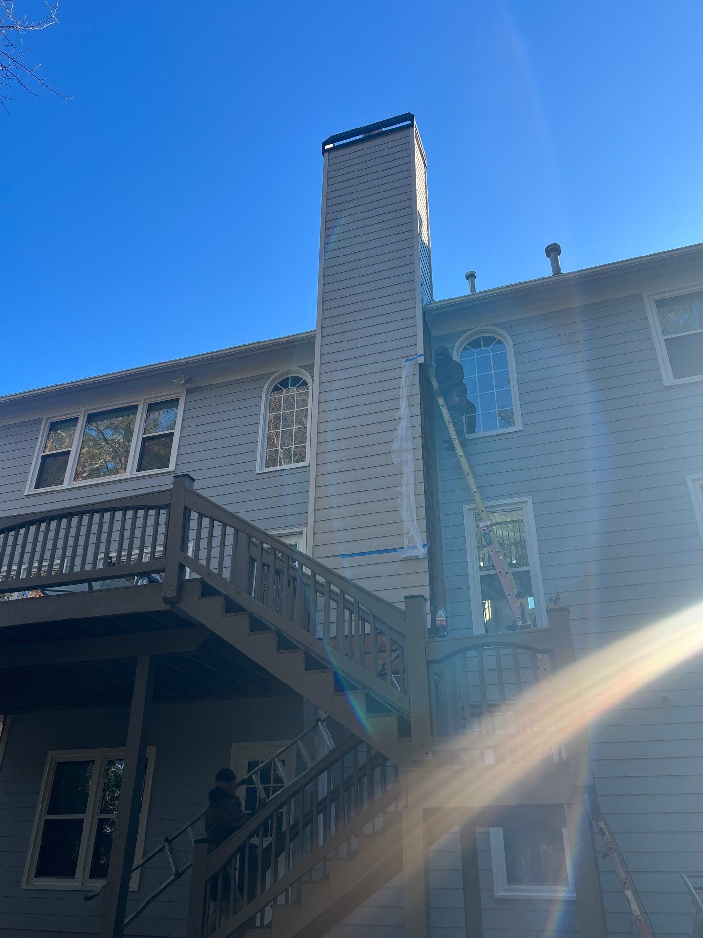 Chimney Siding Reconstruction and Full Exterior Painting in Marietta by Swift Home Renovations